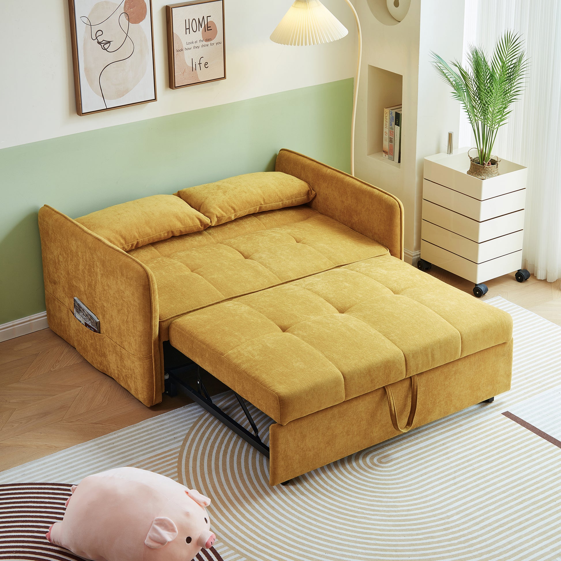 Mustard yellow sofa bed with tufted cushions and pullout ottoman for versatile living