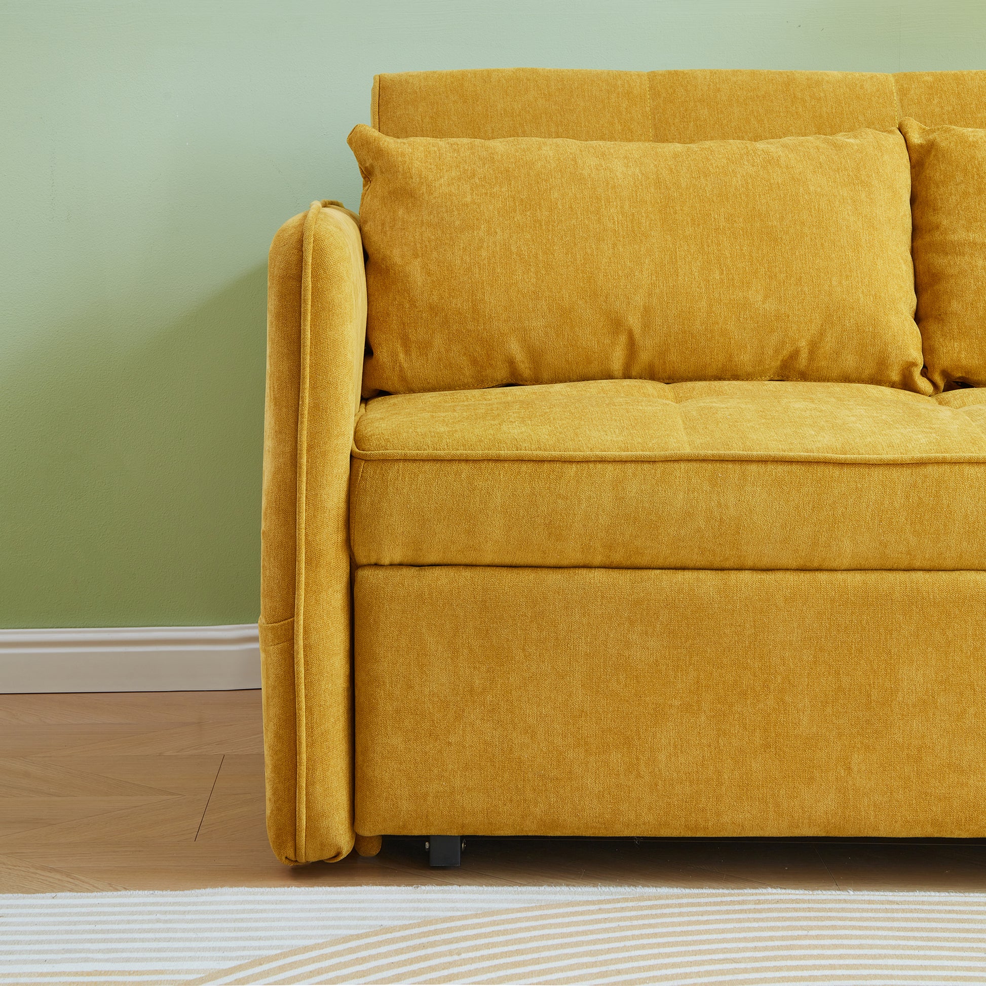 Closeup of a comfortable yellow sofa with textured fabric and plush cushions