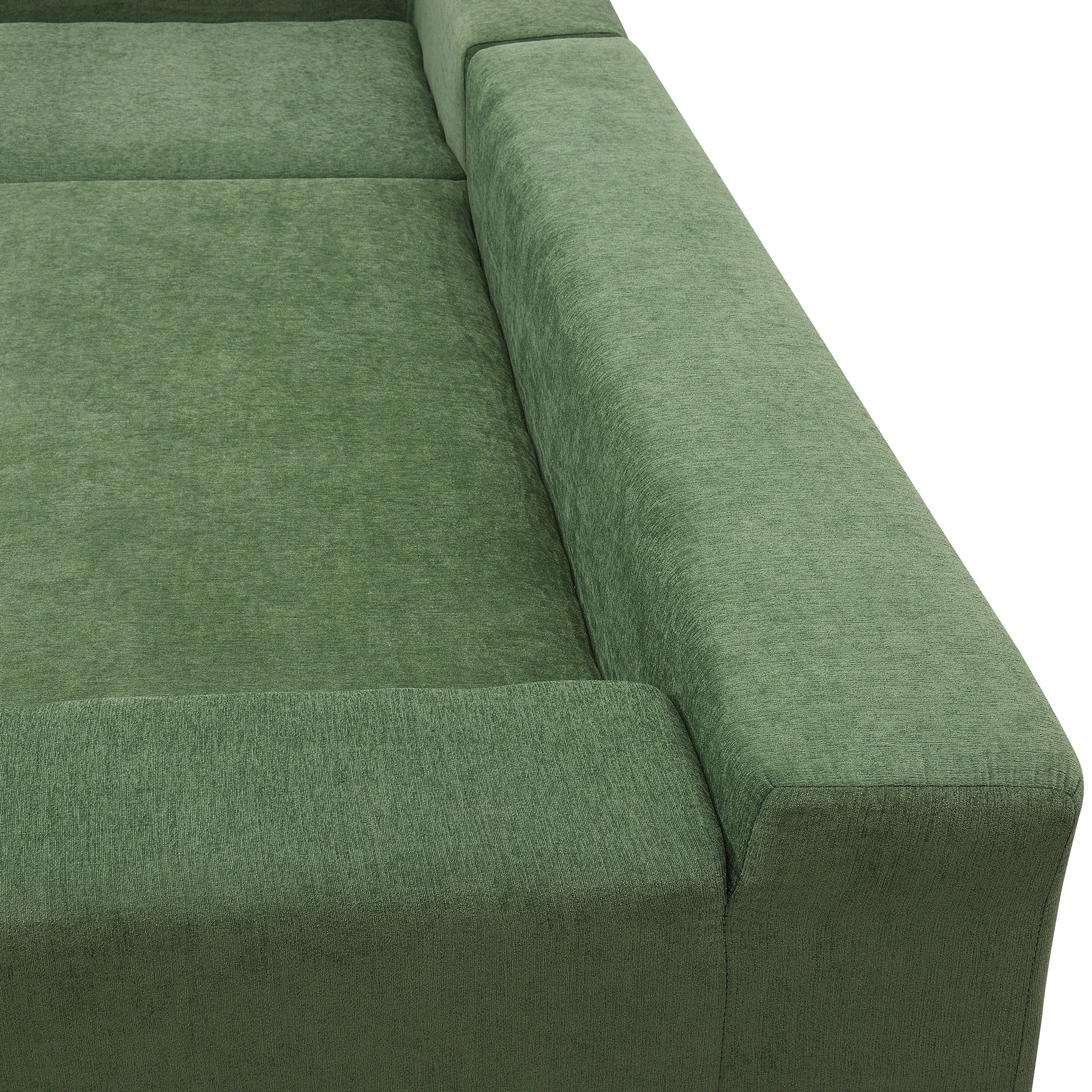 Closeup of plush green sofa fabric with textured weave detail
