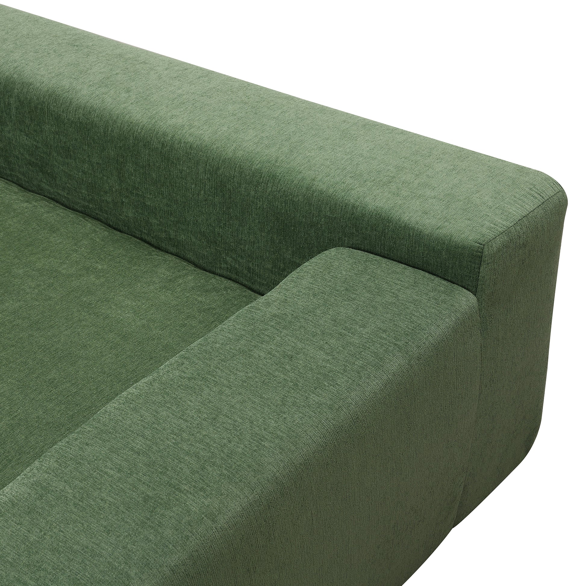Closeup of a textured green fabric couch armrest plush comfort