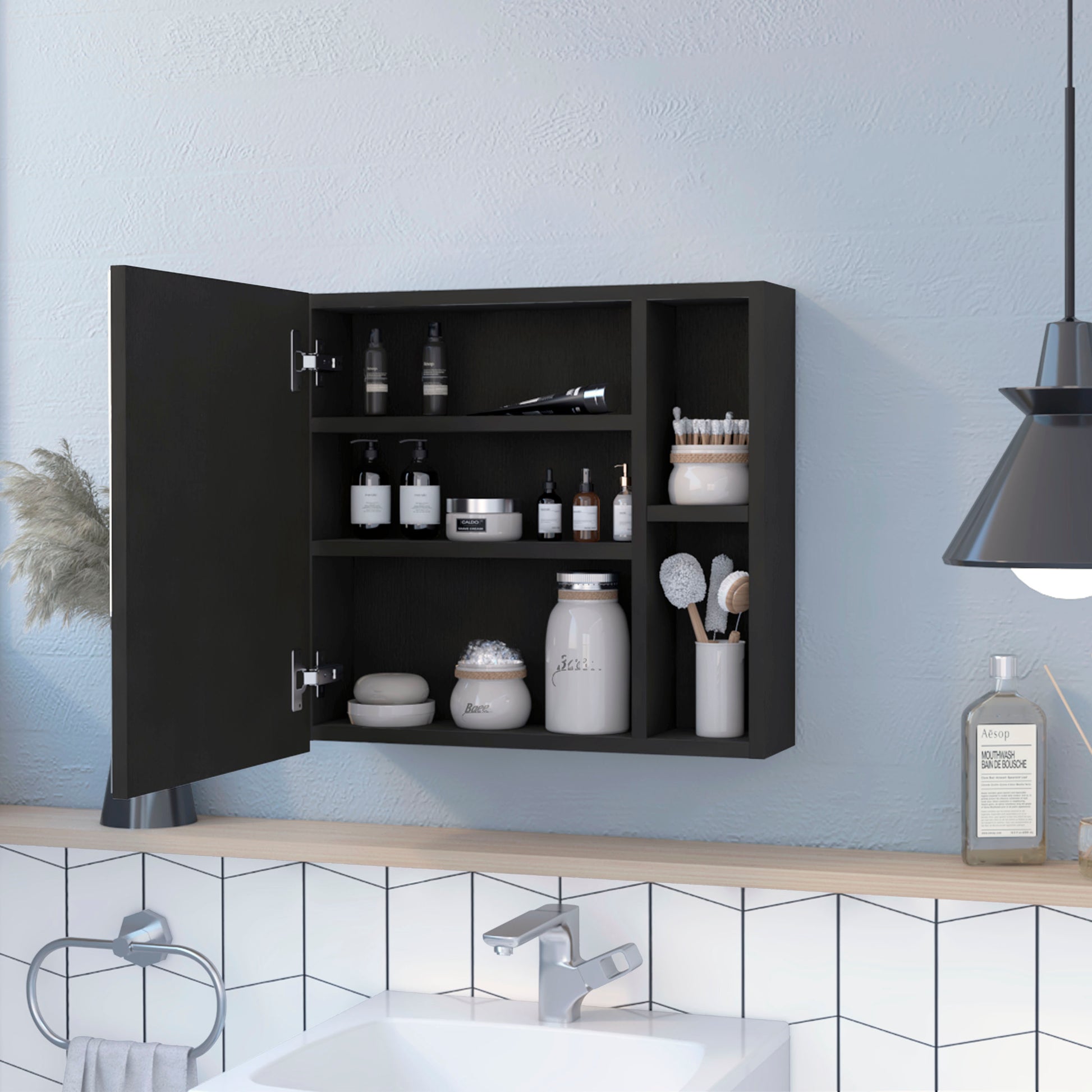Black medicine cabinet with open door displaying various skincare products and bath accessories