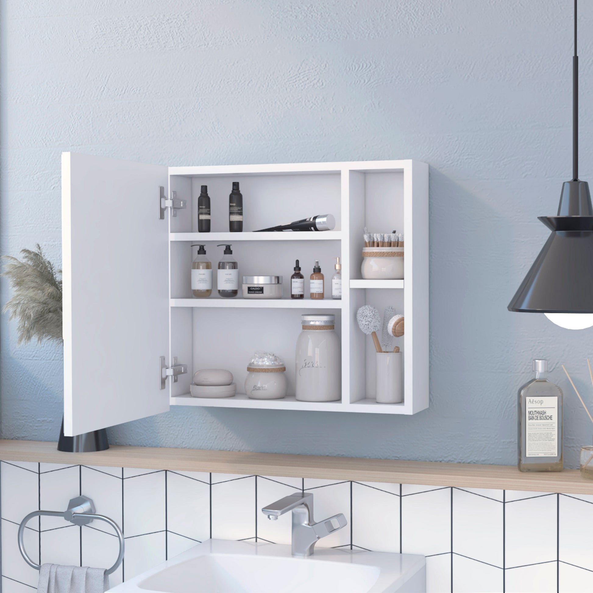 White wallmounted medicine cabinet with open door displaying various skincare and bathroom essentials