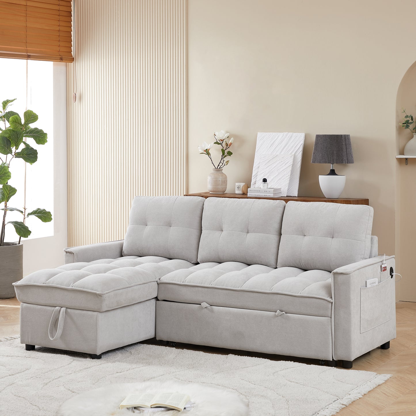 Light gray sectional sofa with storage chaise and tufted cushions ideal for modern living rooms