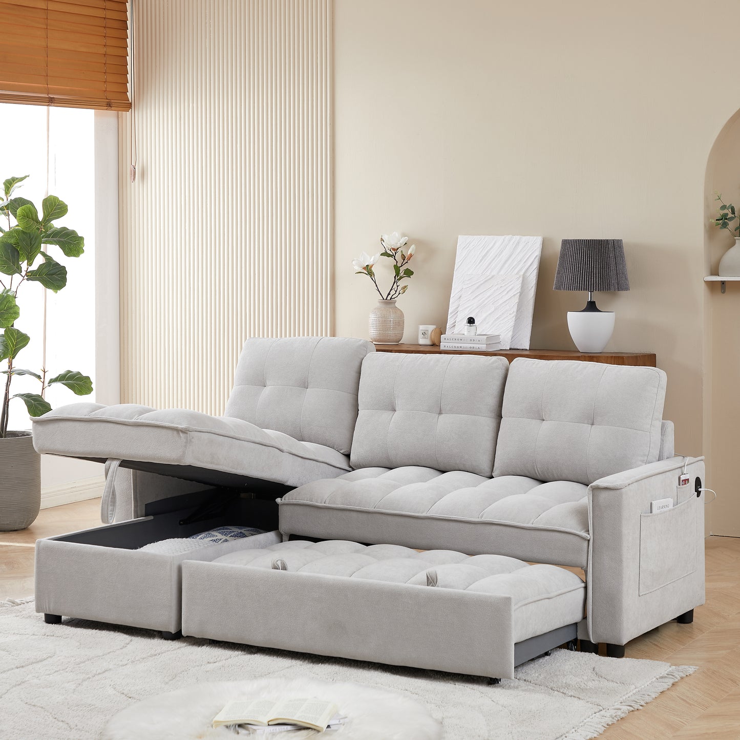 Light gray fabric sectional sofa with pullout bed and storage