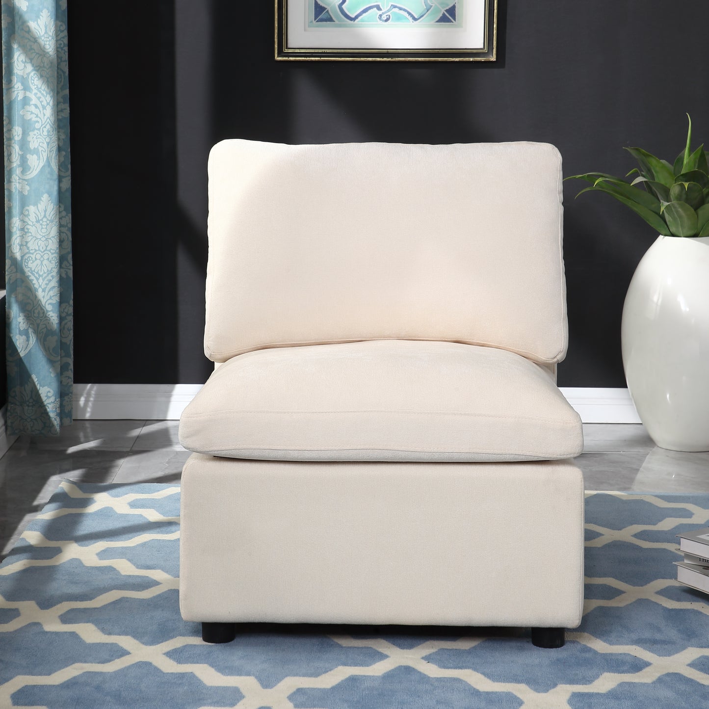 Cream fabric accent chair with plush cushions and clean lines perfect for modern living spaces