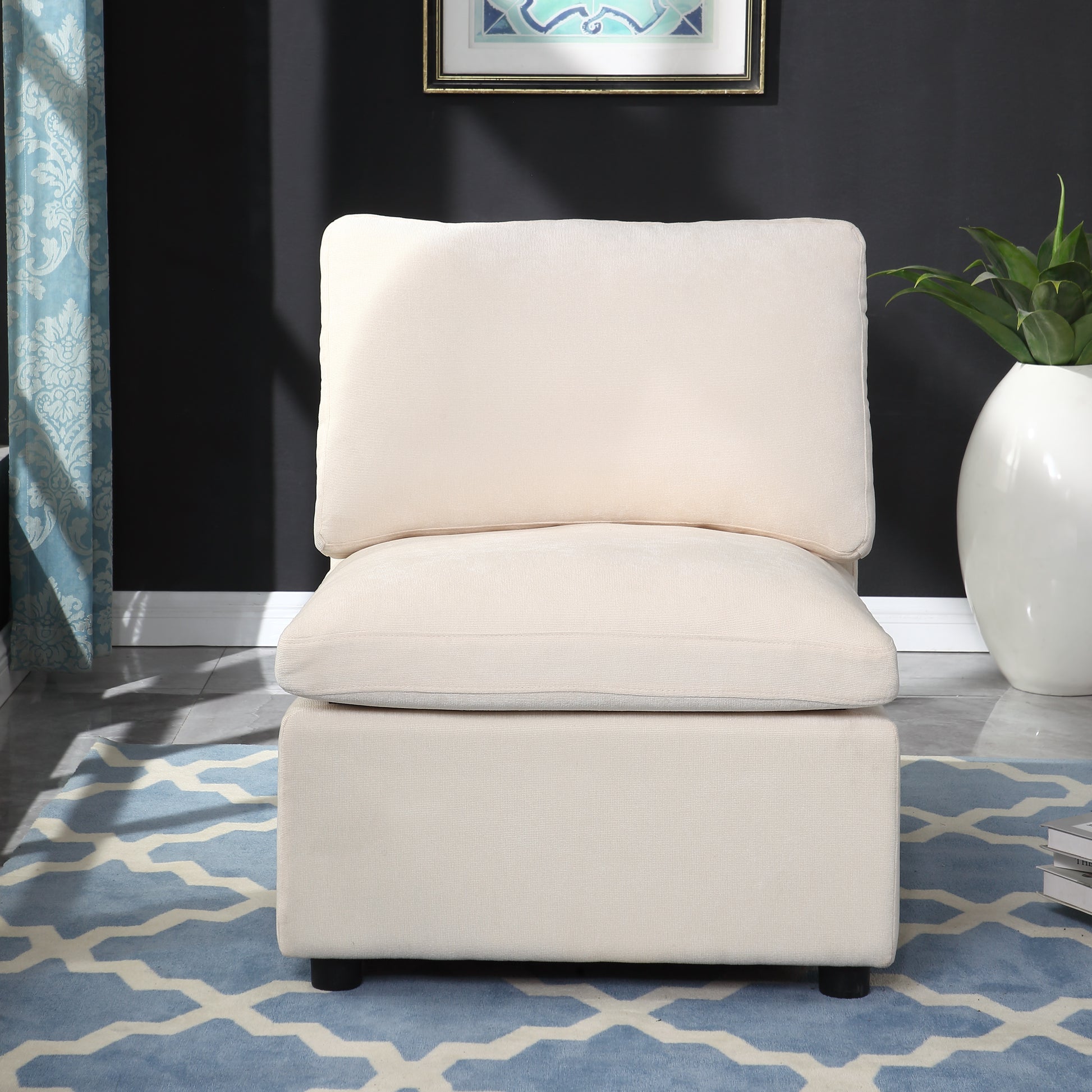 Cream fabric accent chair with plush cushions and clean lines perfect for modern living spaces