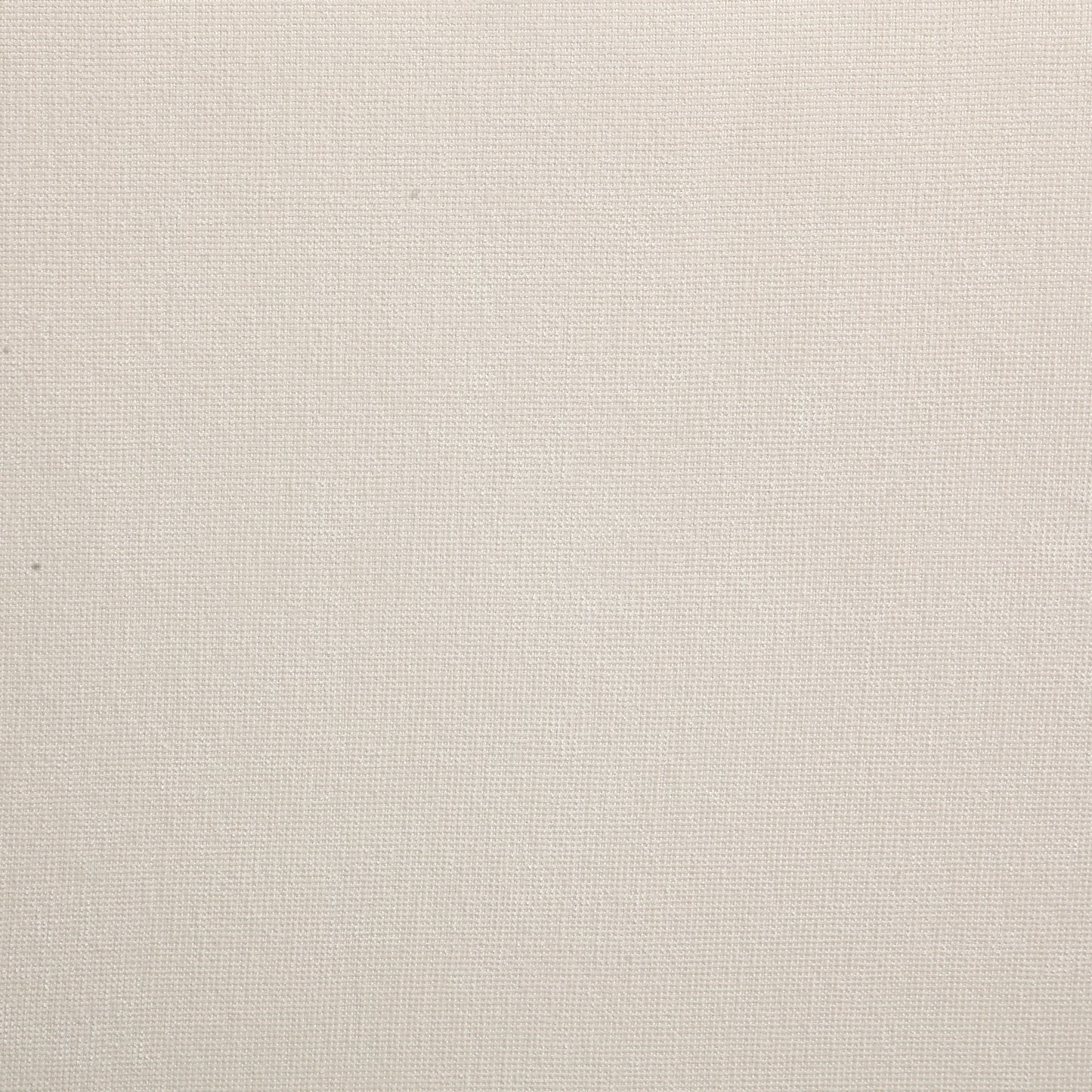 Closeup of a textured beige linen fabric with a visible weave pattern