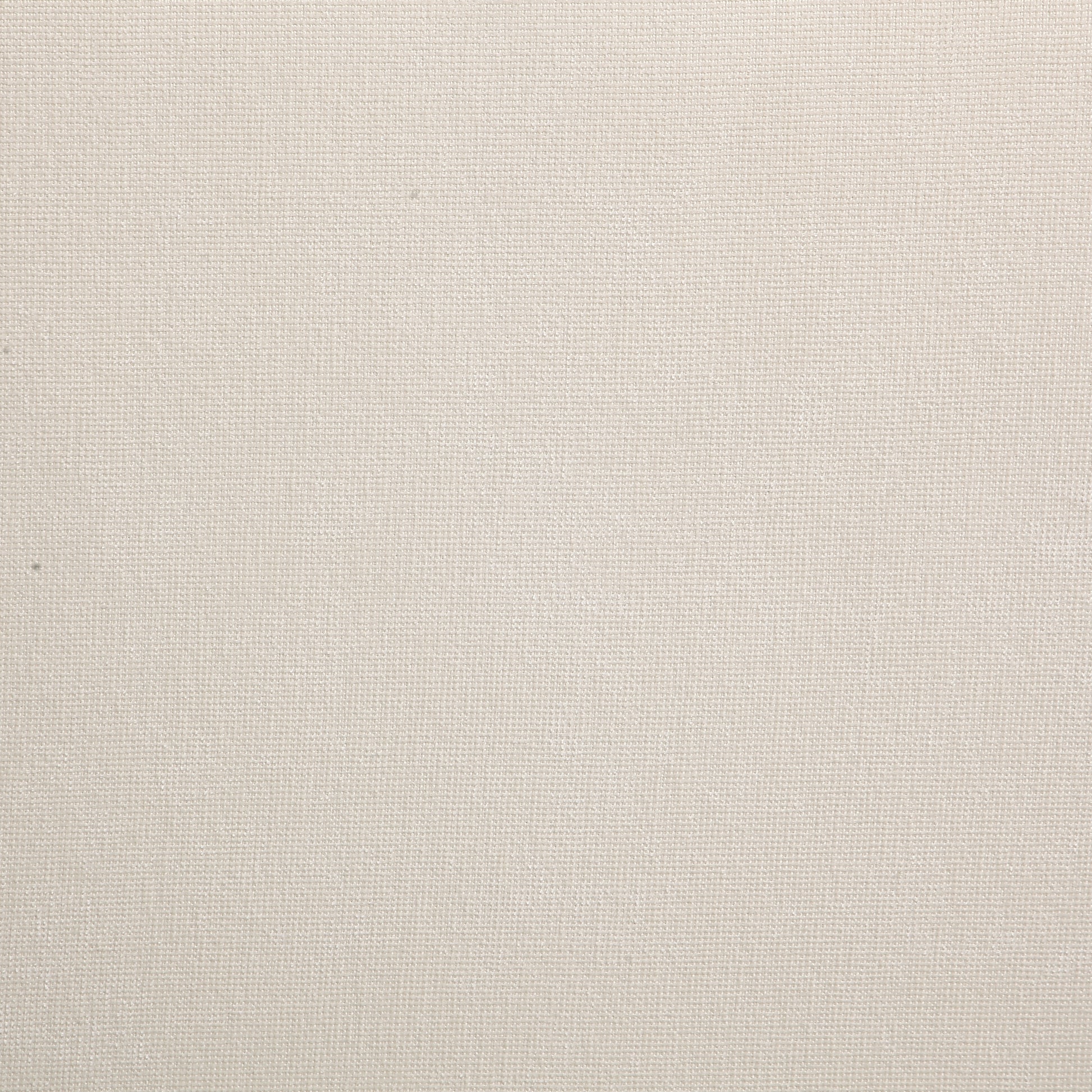 Closeup of a textured beige linen fabric with a visible weave pattern
