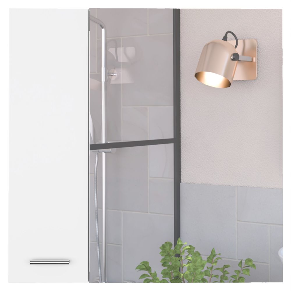 Modern rose gold adjustable wall sconce with a focused beam of light