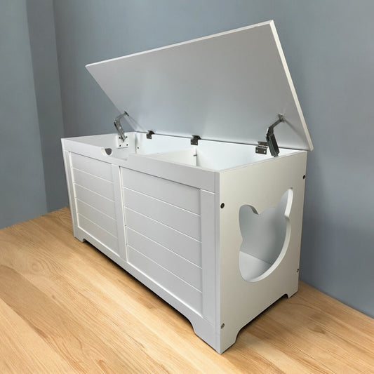 White wooden toy chest with a hinged lid and catshaped cutouts