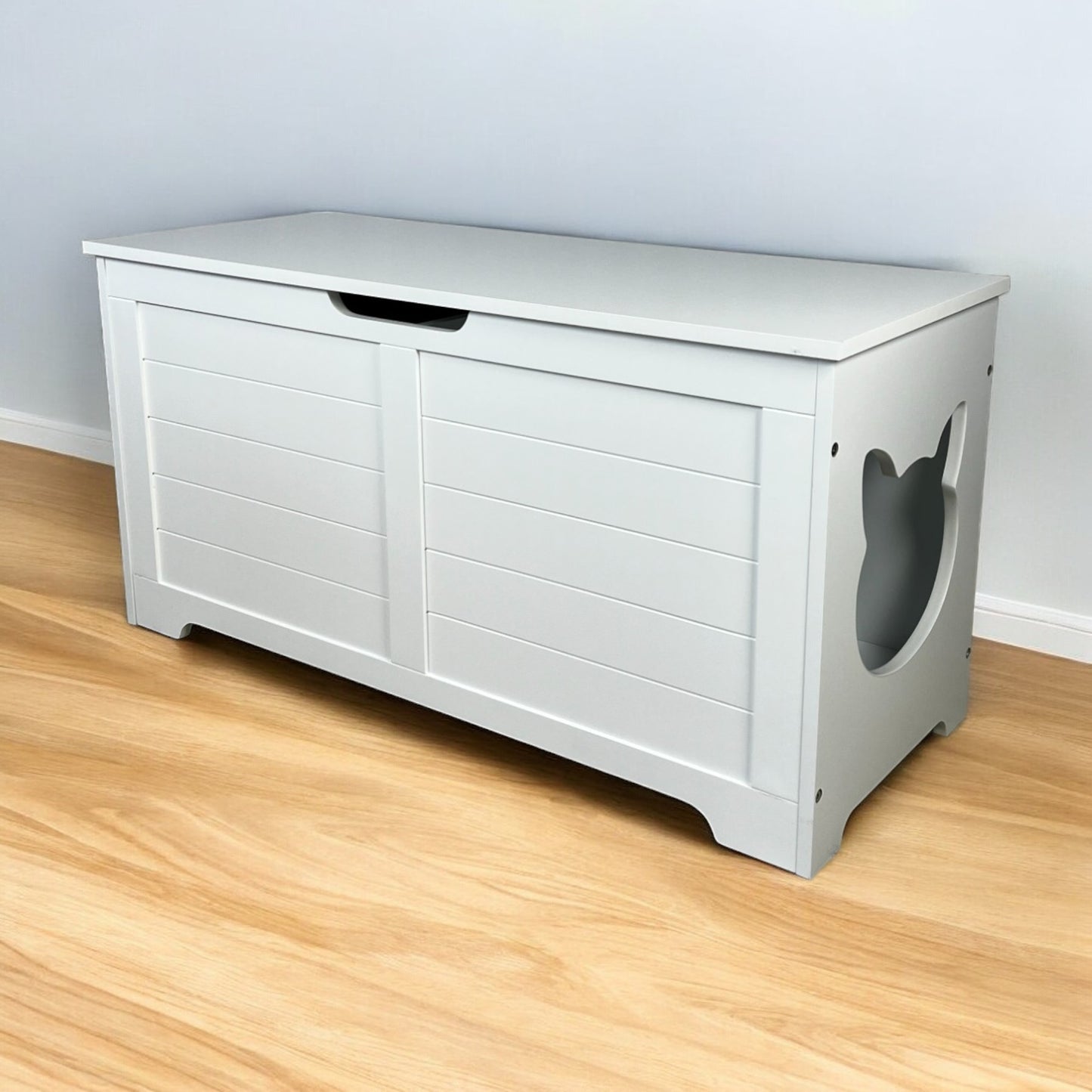 White wooden cat litter box enclosure with cat ear cutout detail