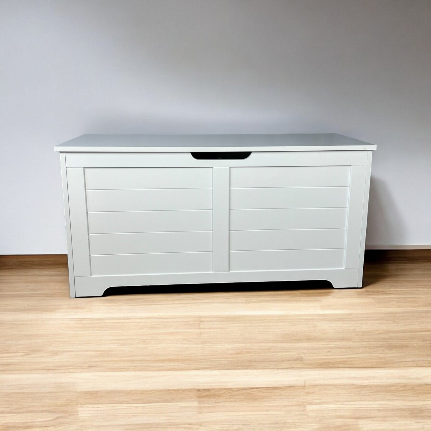 Classic grey toy chest with horizontal paneling and cutout handle