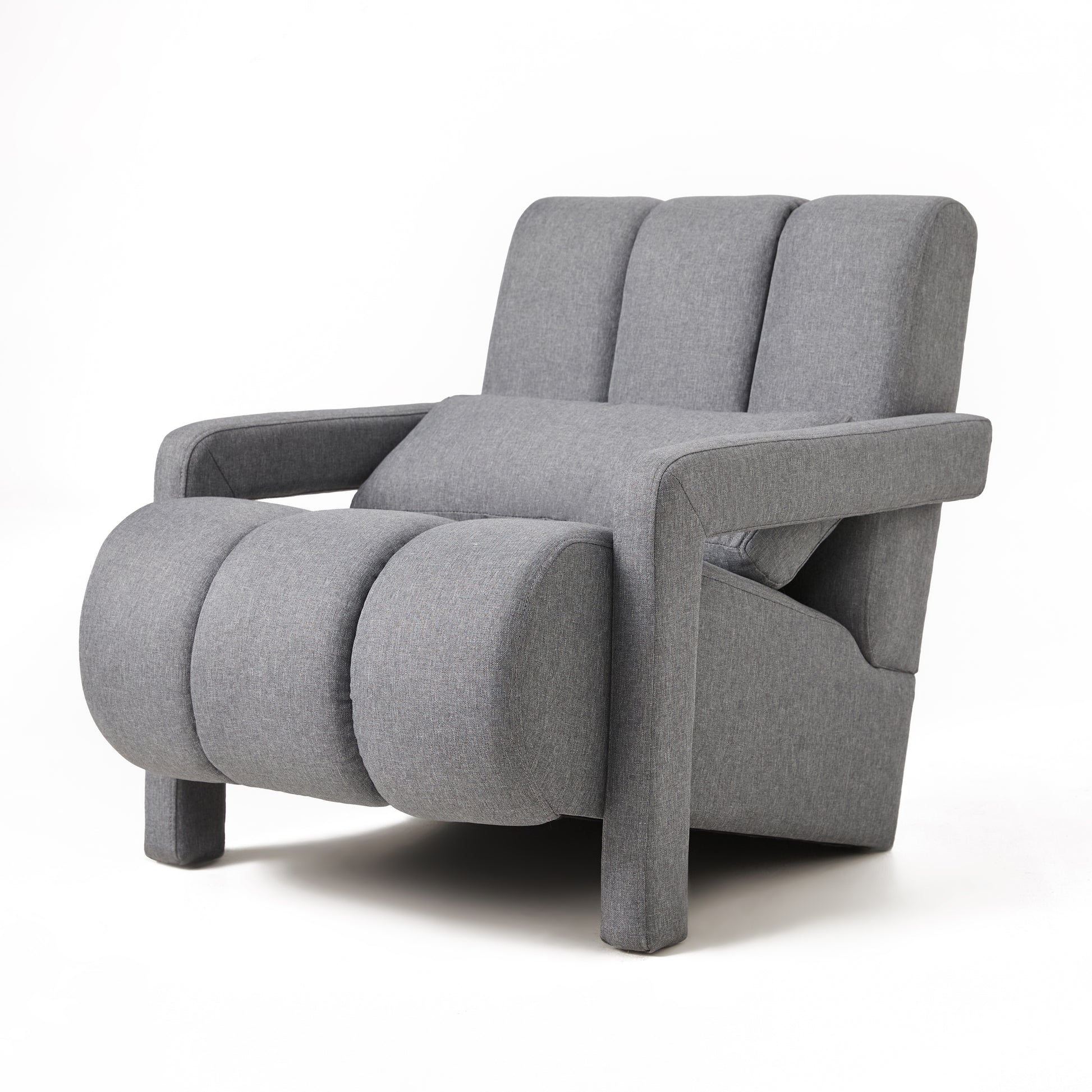 Modern grey fabric armchair with plush segmented cushioning for ultimate comfort
