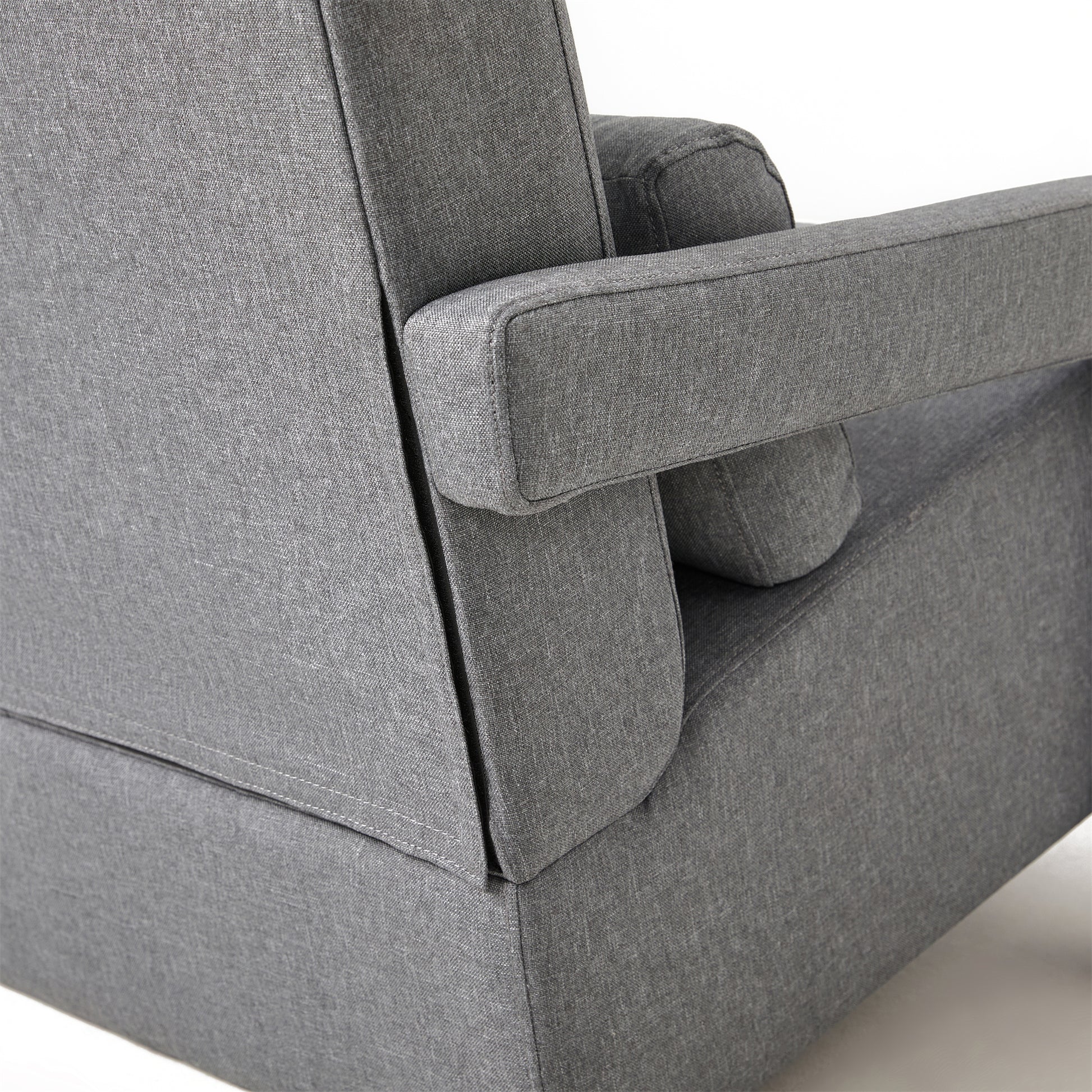 Closeup of grey fabric armchair armrest with visible stitching detail