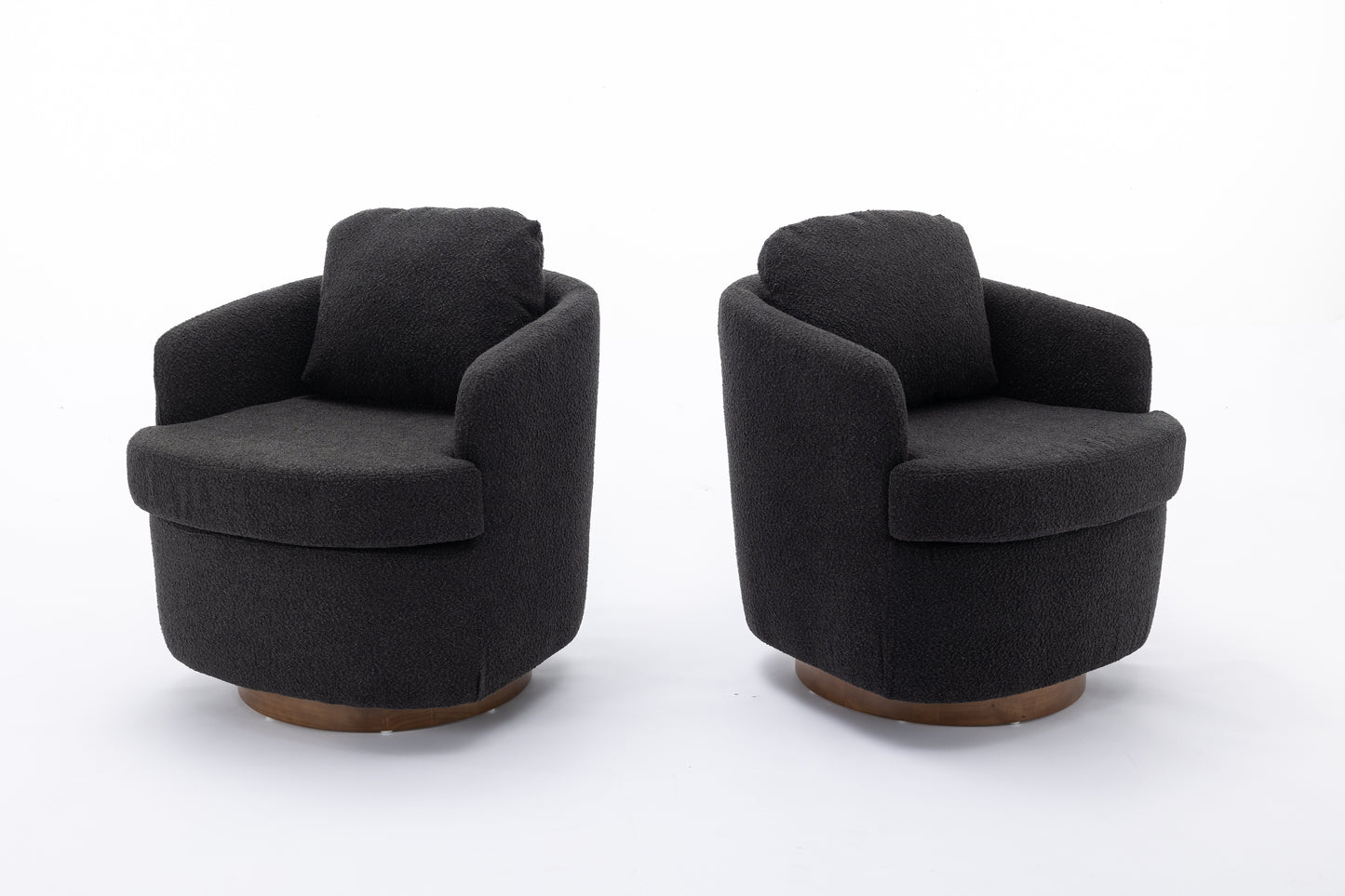 Two dark gray boucle swivel accent chairs with wooden bases