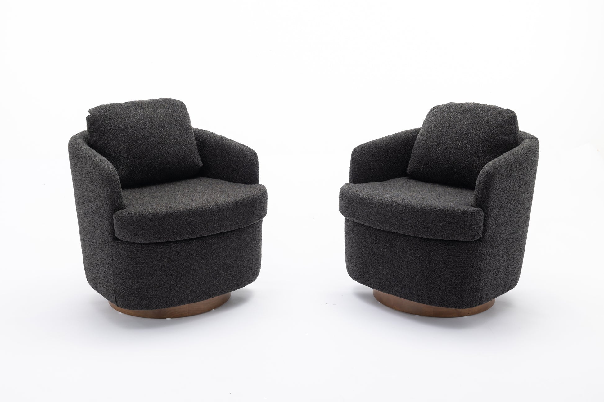 Dark grey boucle armchair with rounded shape and wooden base perfect for a modern living room