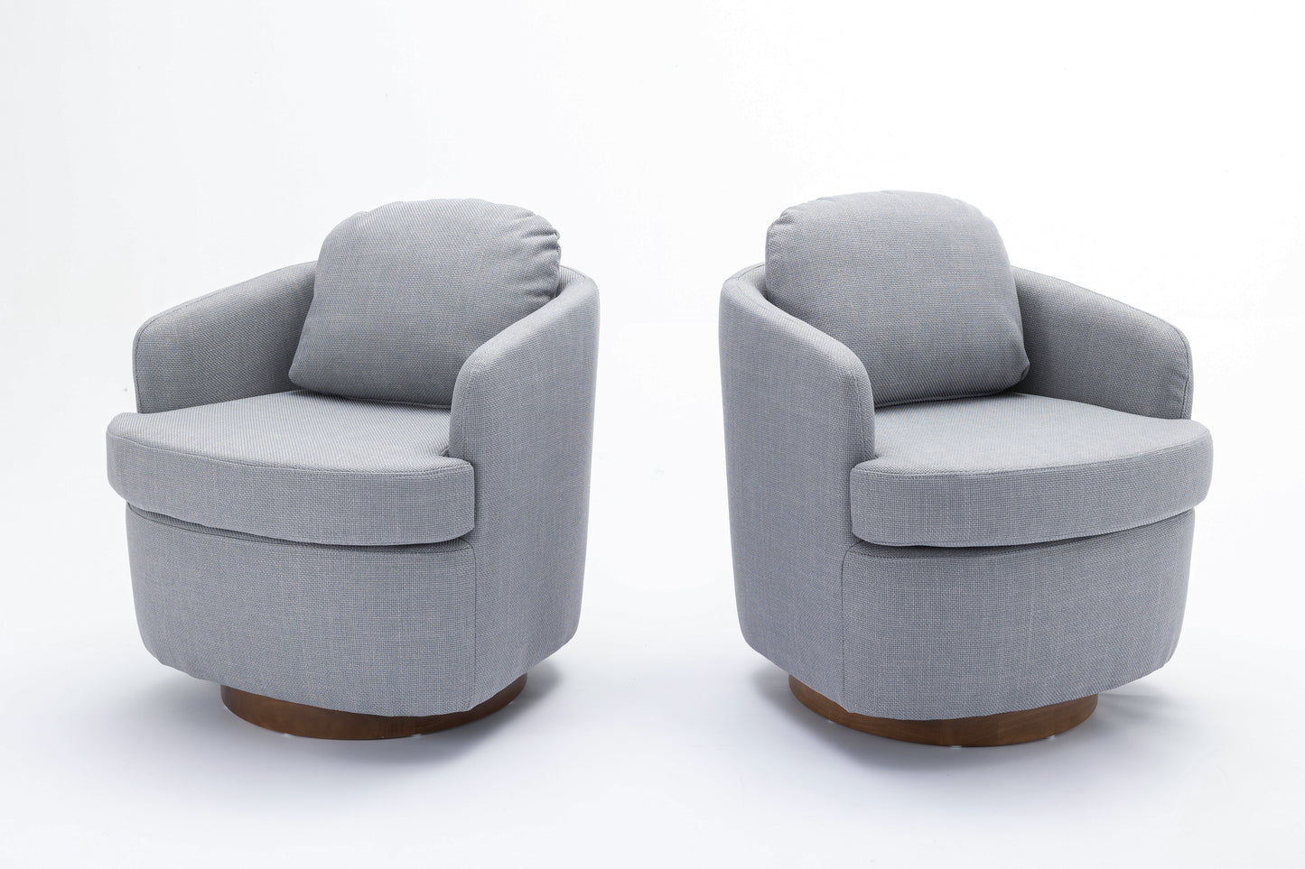 Two comfortable grey fabric swivel chairs with wooden bases perfect for a living room