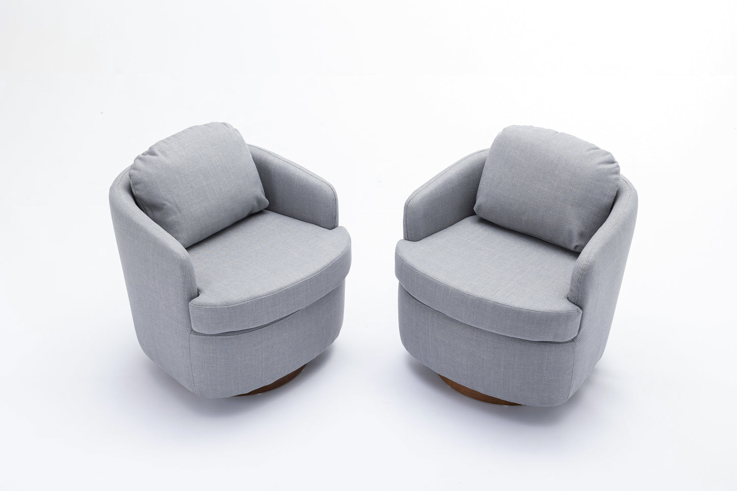 Pair of modern grey fabric accent chairs with round wooden bases