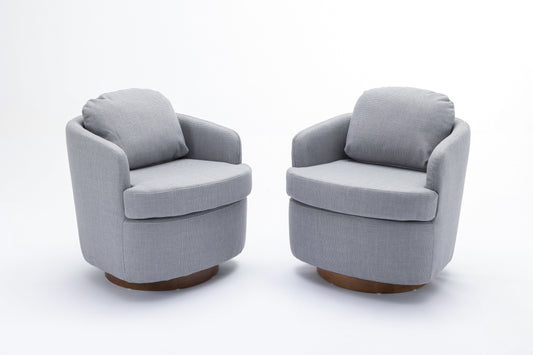 Pair of grey fabric accent chairs with round wooden bases