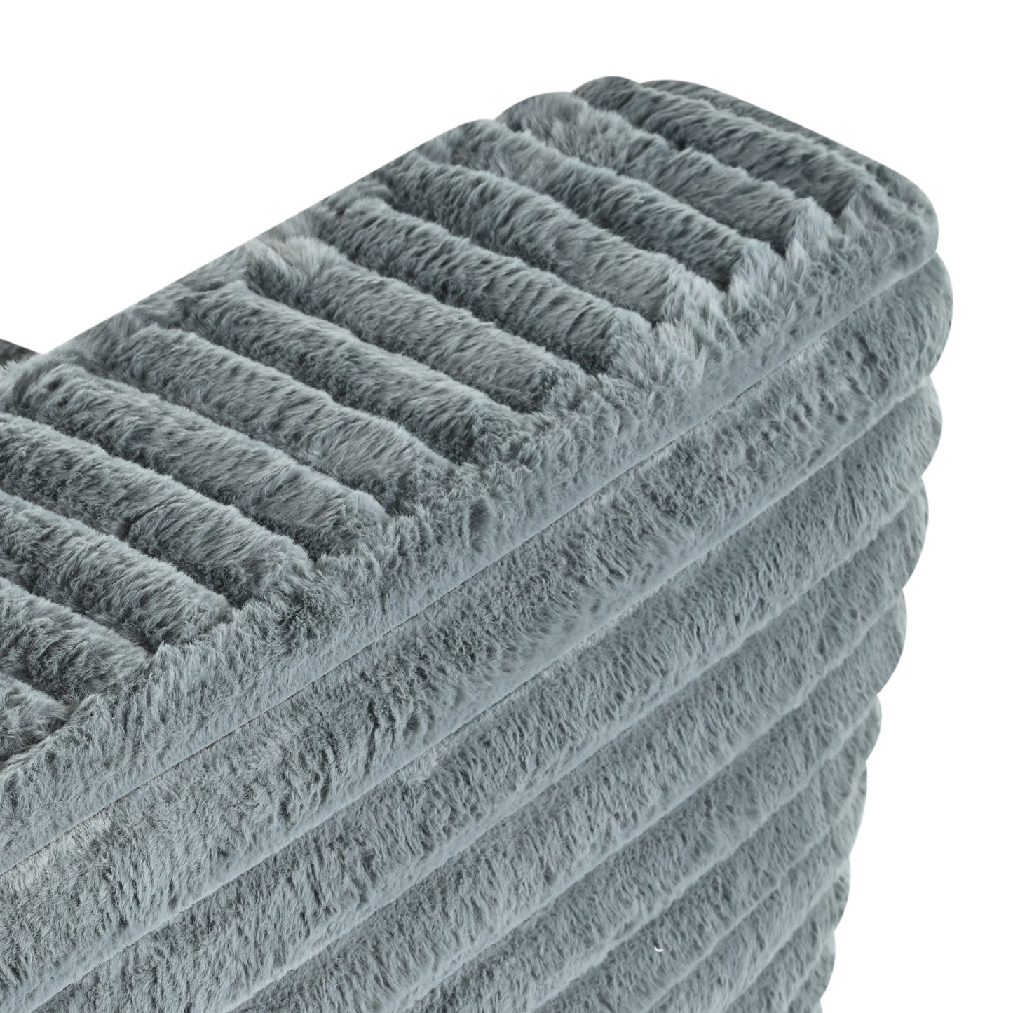 Soft grey plush throw blanket with ribbed texture for cozy home decor