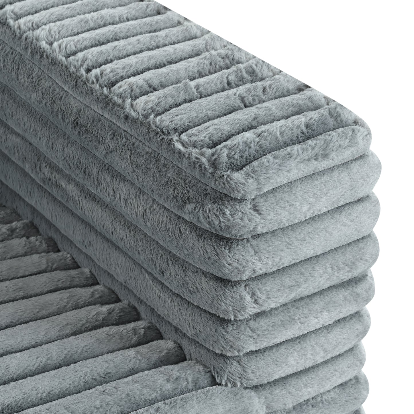 Plush grey faux fur throw blanket with ribbed texture detail