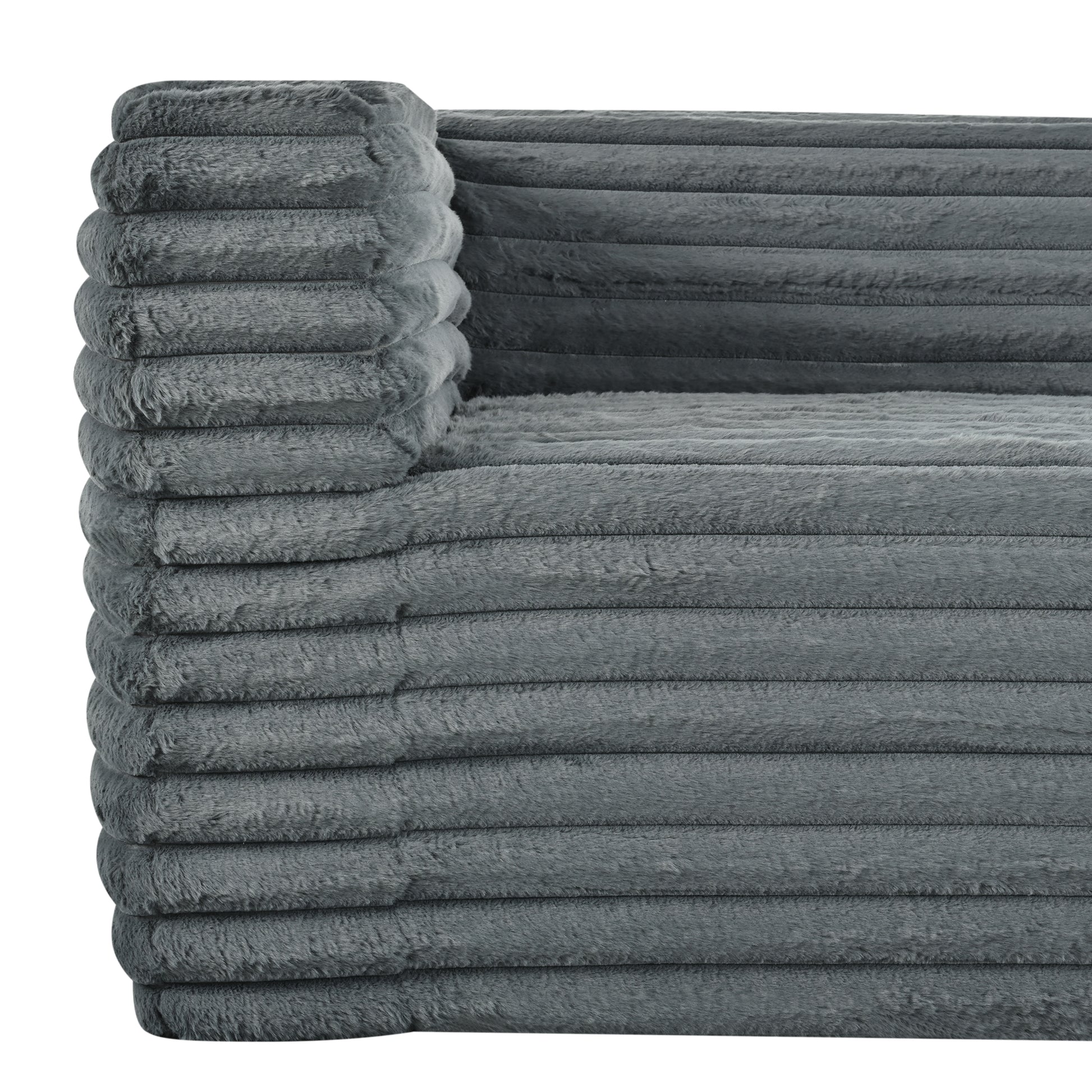 Plush grey corduroy sofa detail offering luxurious comfort and modern style for any living room