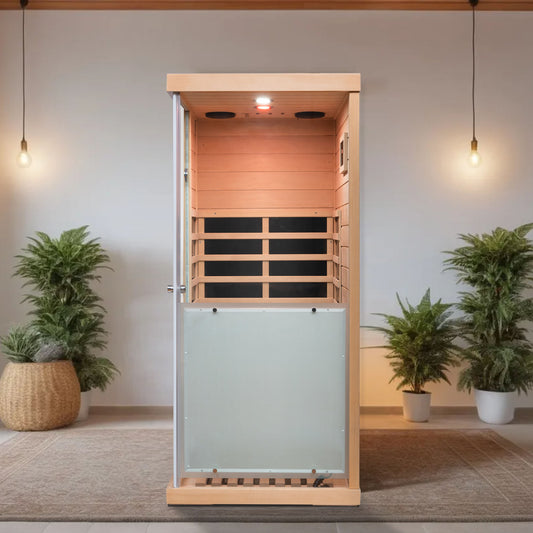 Modern wooden infrared sauna cabin with glass door featuring interior lighting