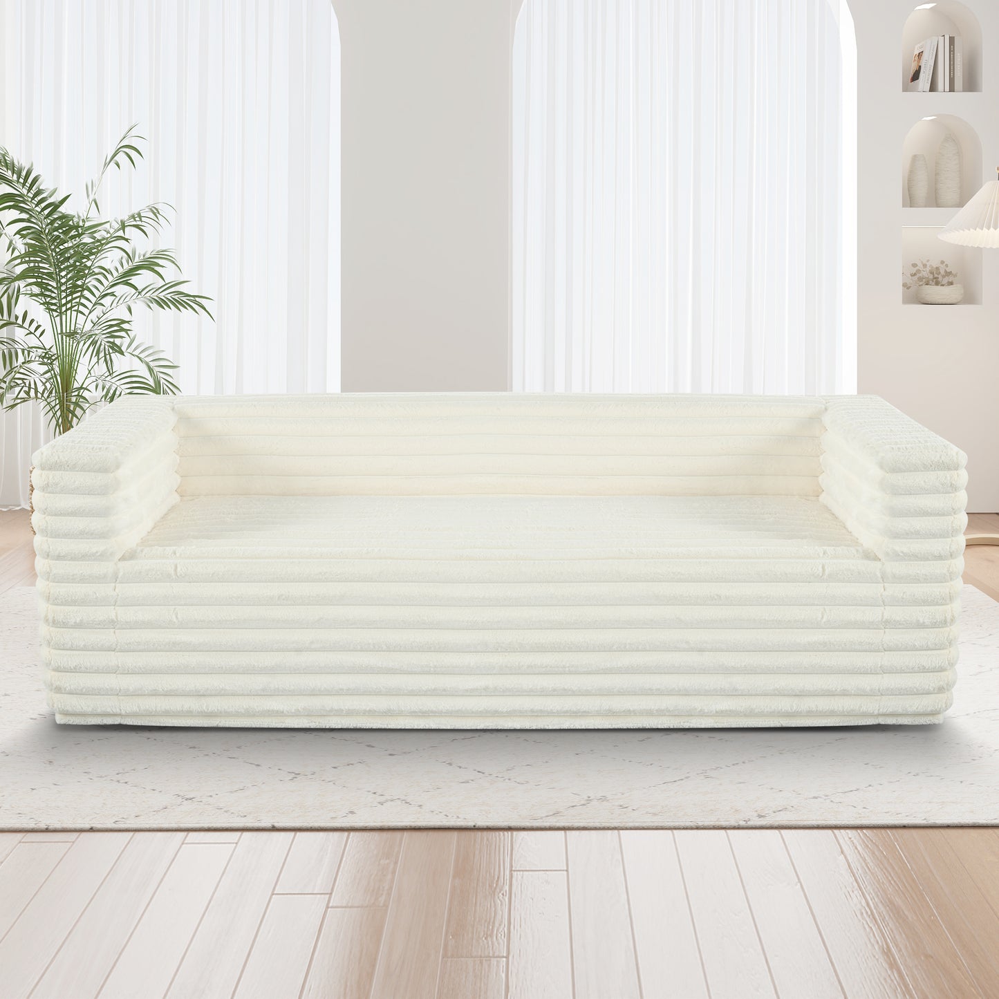 Cream corduroy sofa with plush fabric and rounded arms perfect for modern living rooms