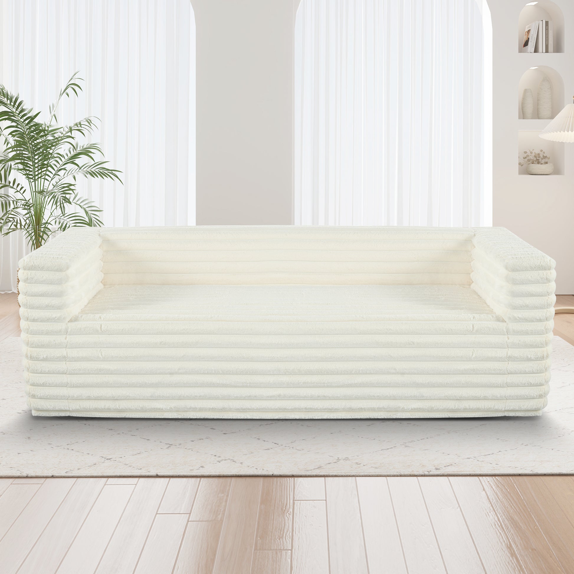 Cream corduroy sofa with plush fabric and rounded arms perfect for modern living rooms