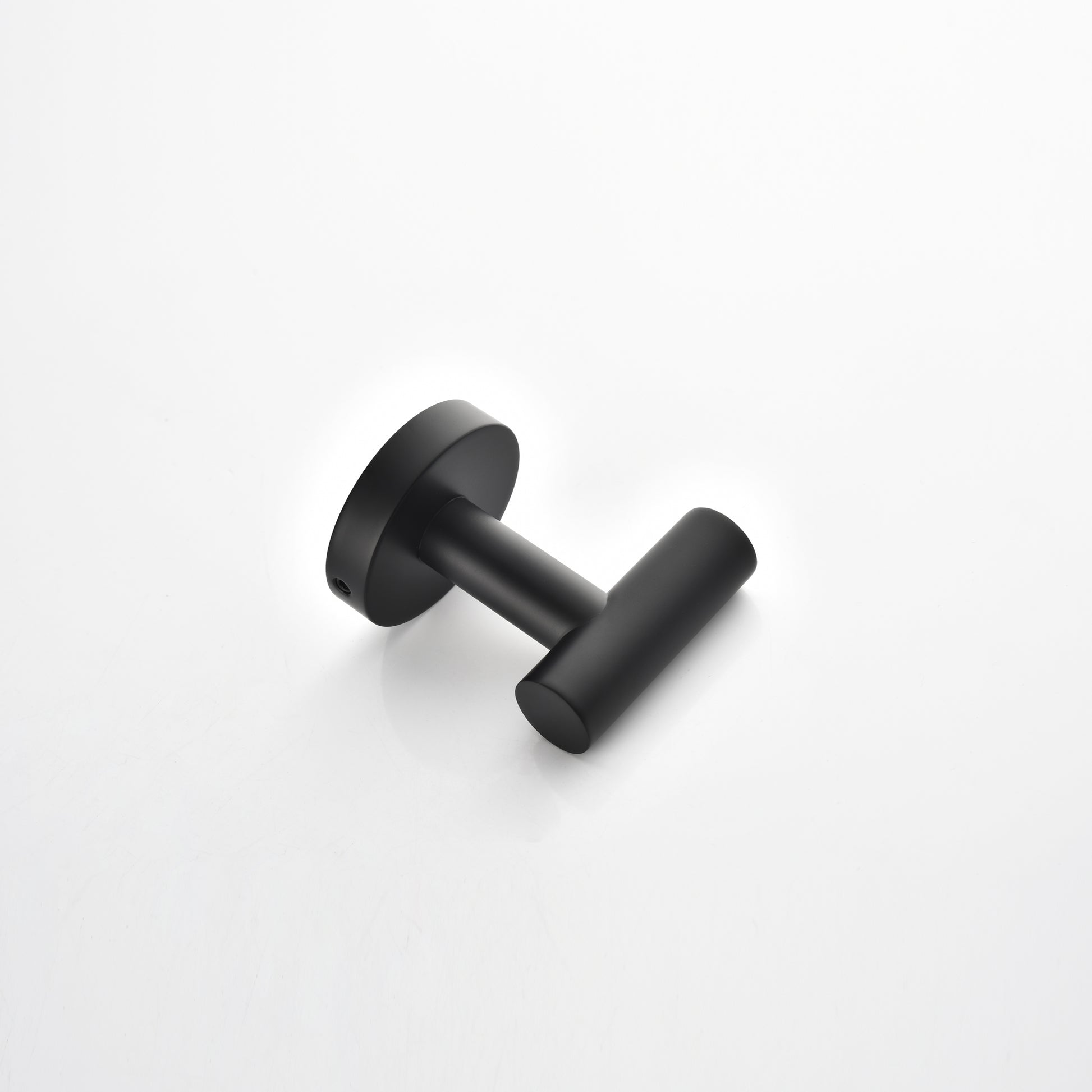 Matte black metal wall hook with a minimalist cylindrical design for bathroom towels