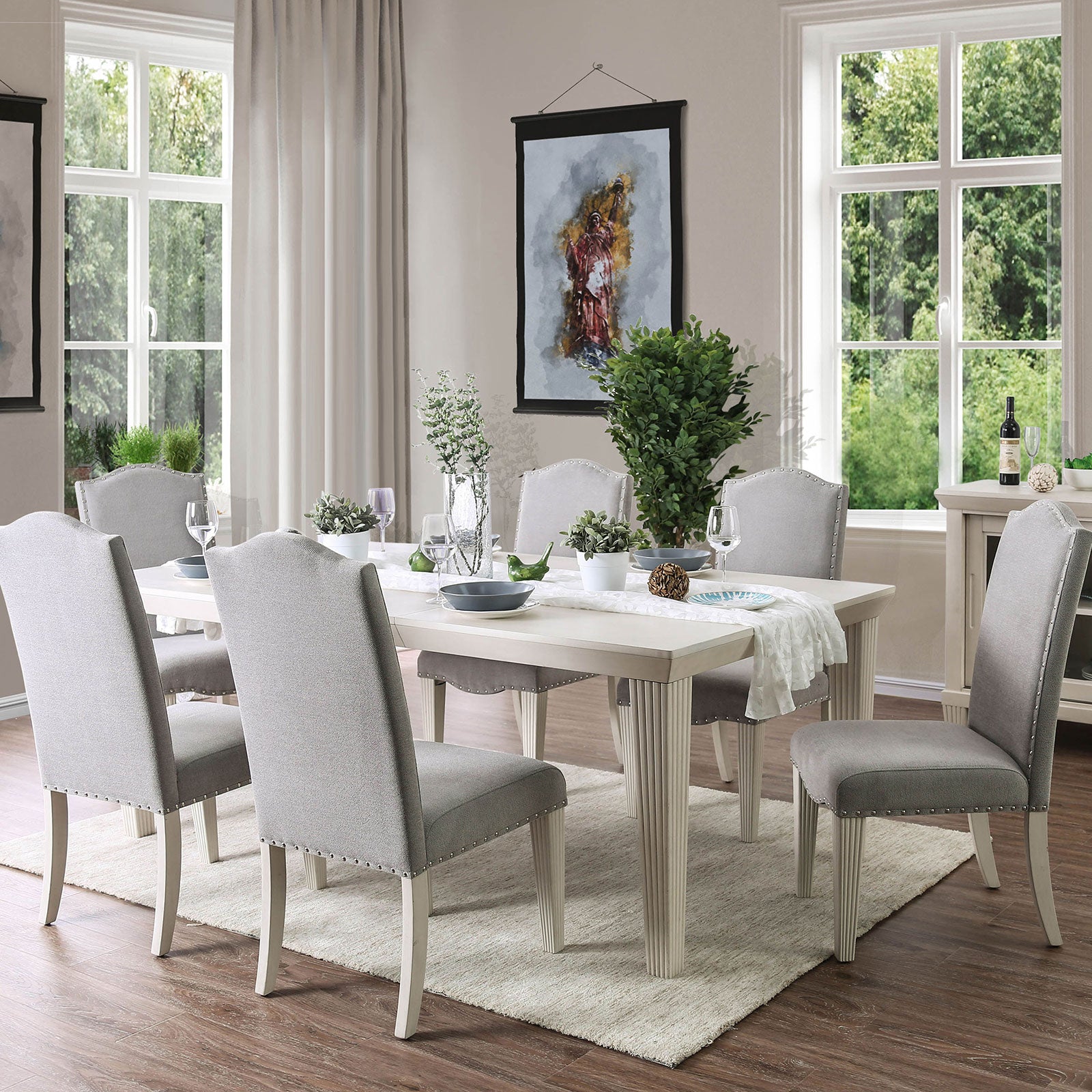 Cream dining table set with upholstered grey chairs