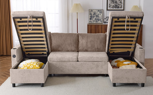 Beige sectional sofa with hidden storage compartments and pullout bed mechanism exposed