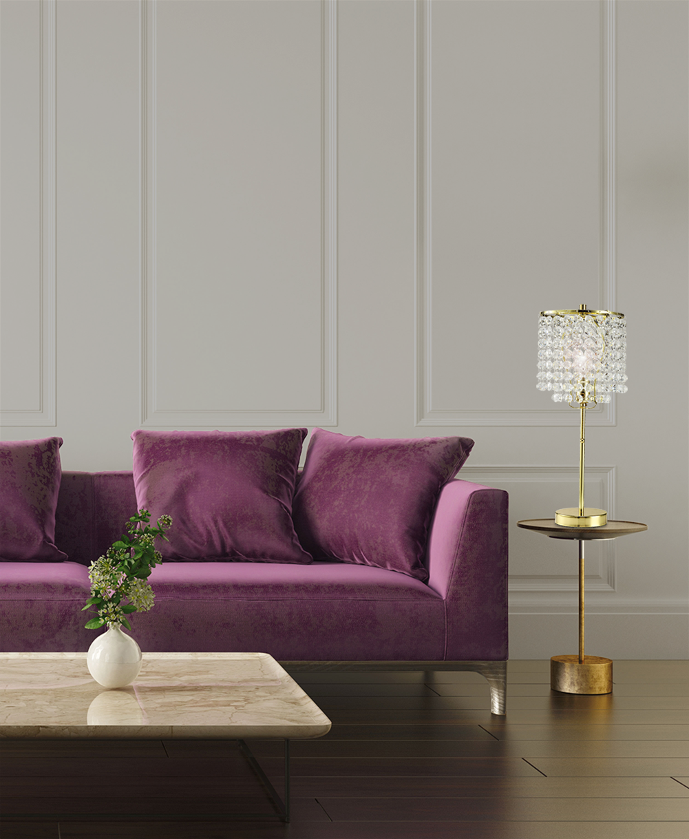Plush purple velvet sofa with accent pillows perfect for a luxurious living room