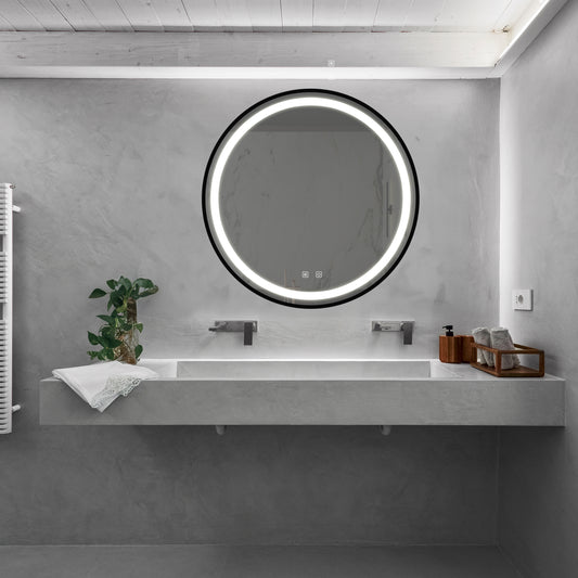 Modern circular bathroom mirror with integrated LED lighting and touch controls