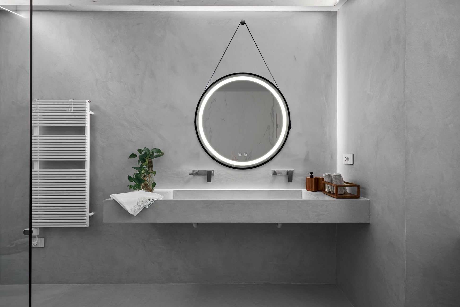 Modern round vanity mirror with integrated LED lighting and touch controls