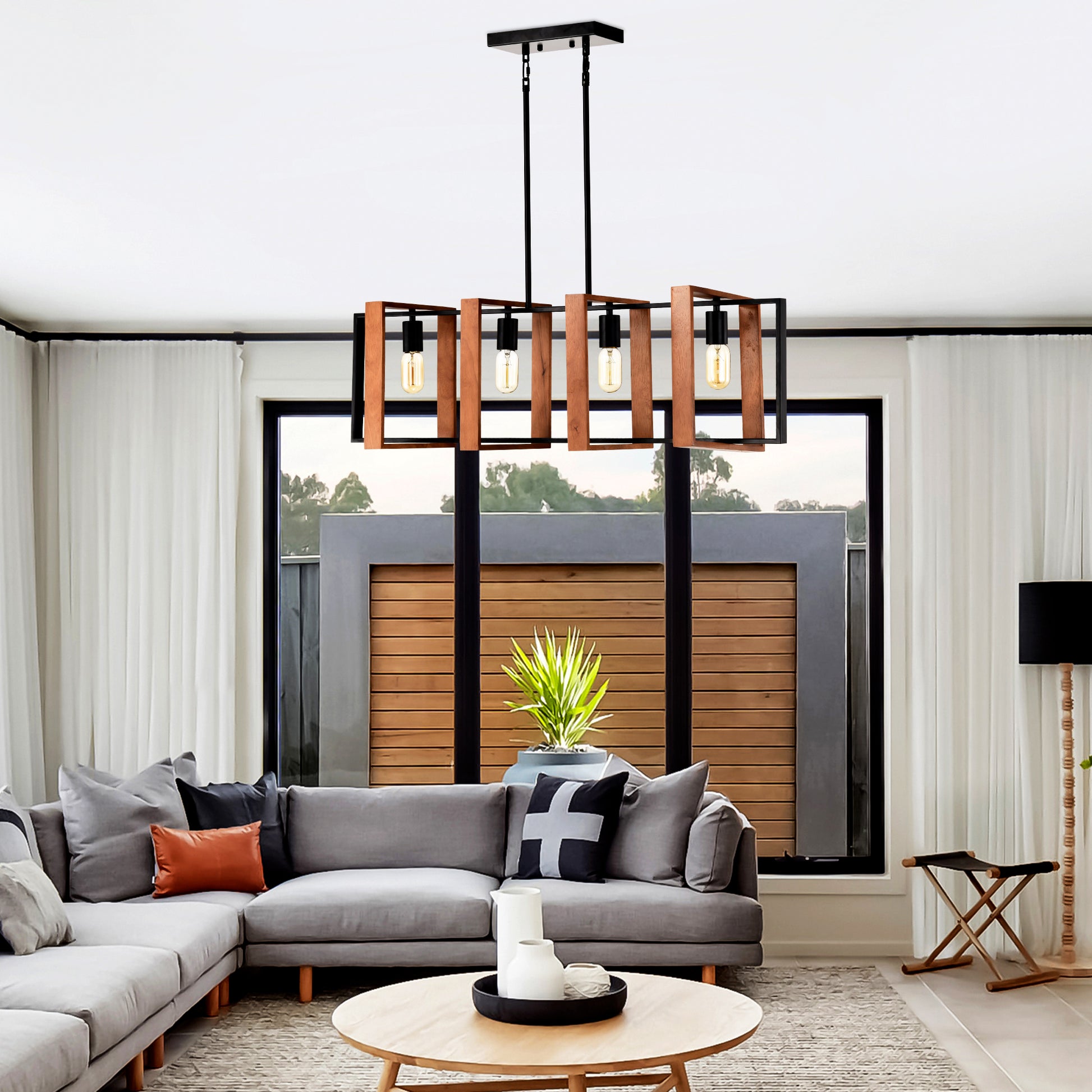 Modern wood and black pendant light with four Edison bulbs for dining room