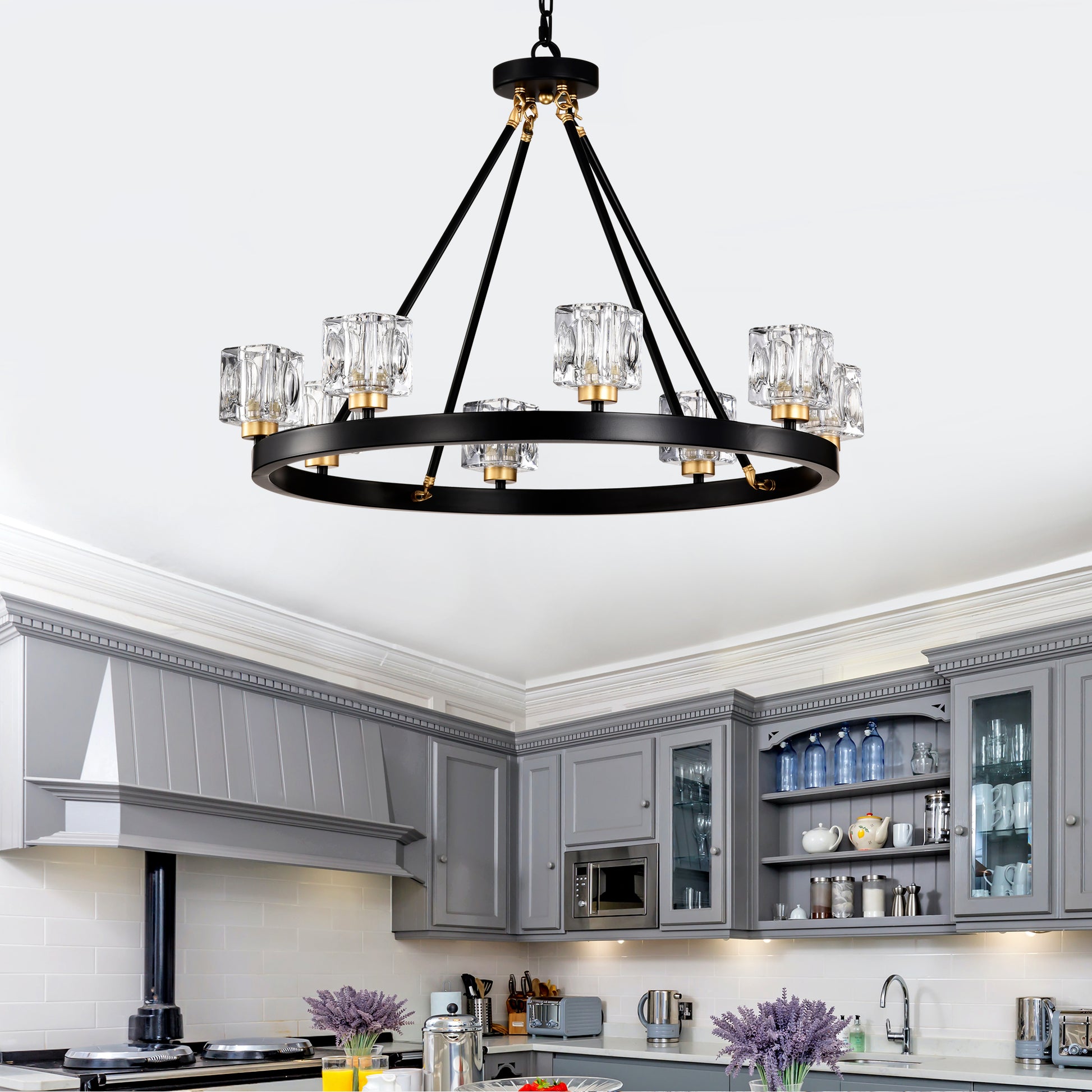 Black modern chandelier with crystal shades and gold accents for dining room