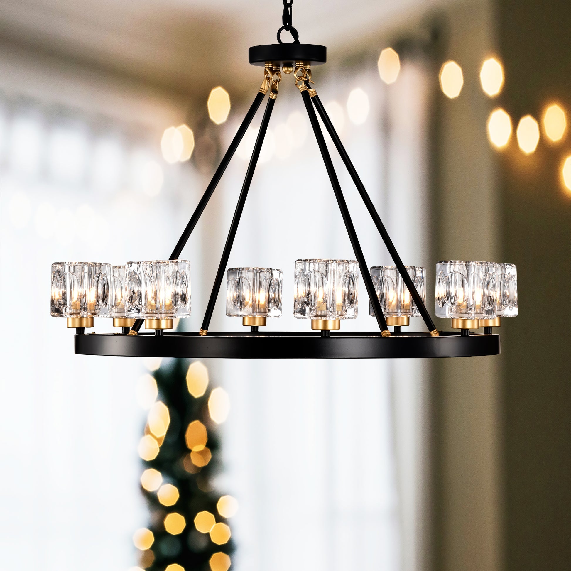 Modern light black chandelier with crystal shades and brass accents