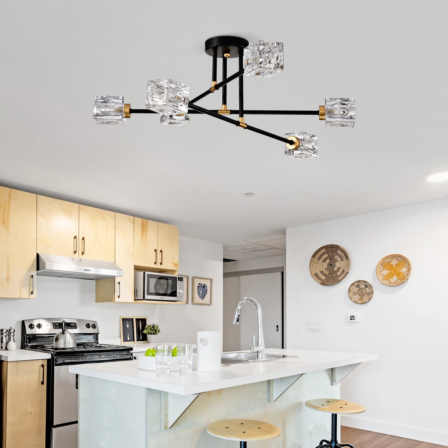 Modern black chandelier with clear glass cube shades and gold accents