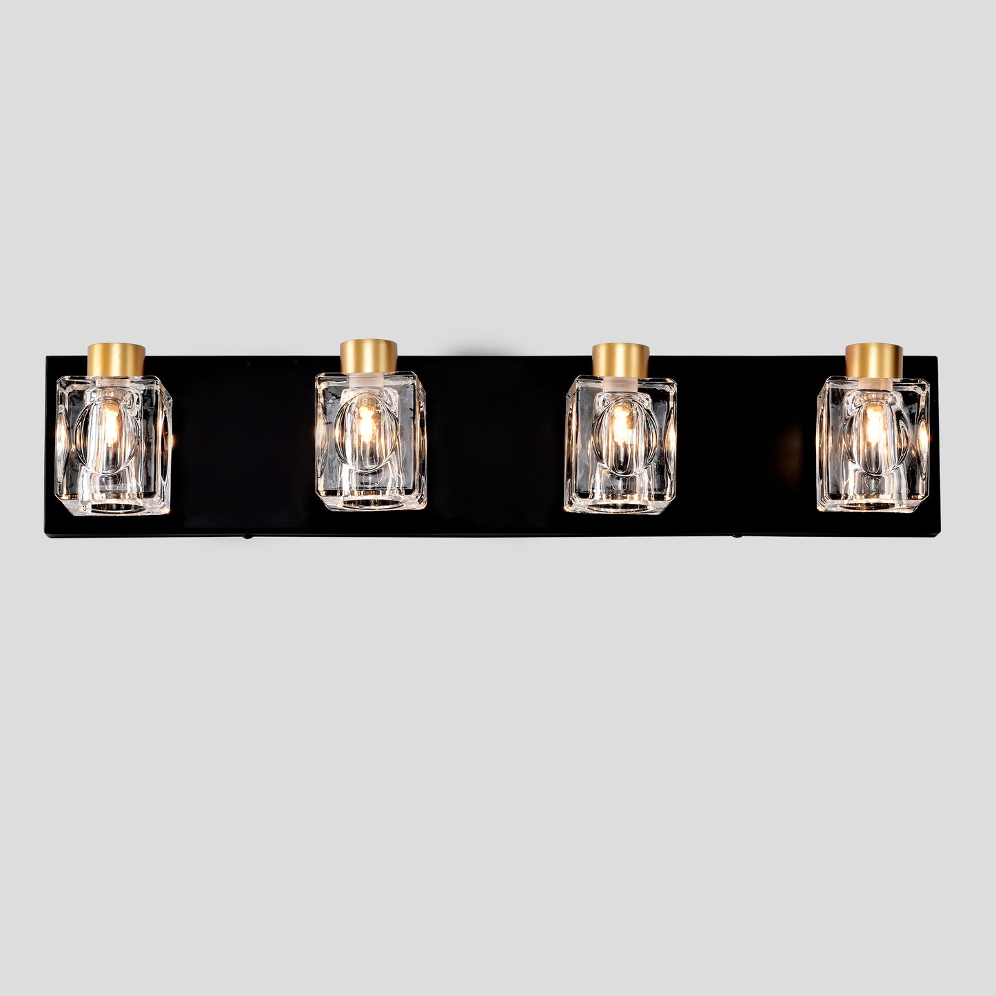 Black vanity light with four square clear glass shades and gold accents
