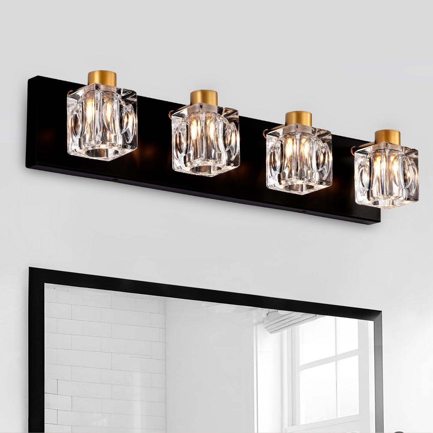 Fourlight modern vanity light with clear crystal shades and brushed gold accents on a black base