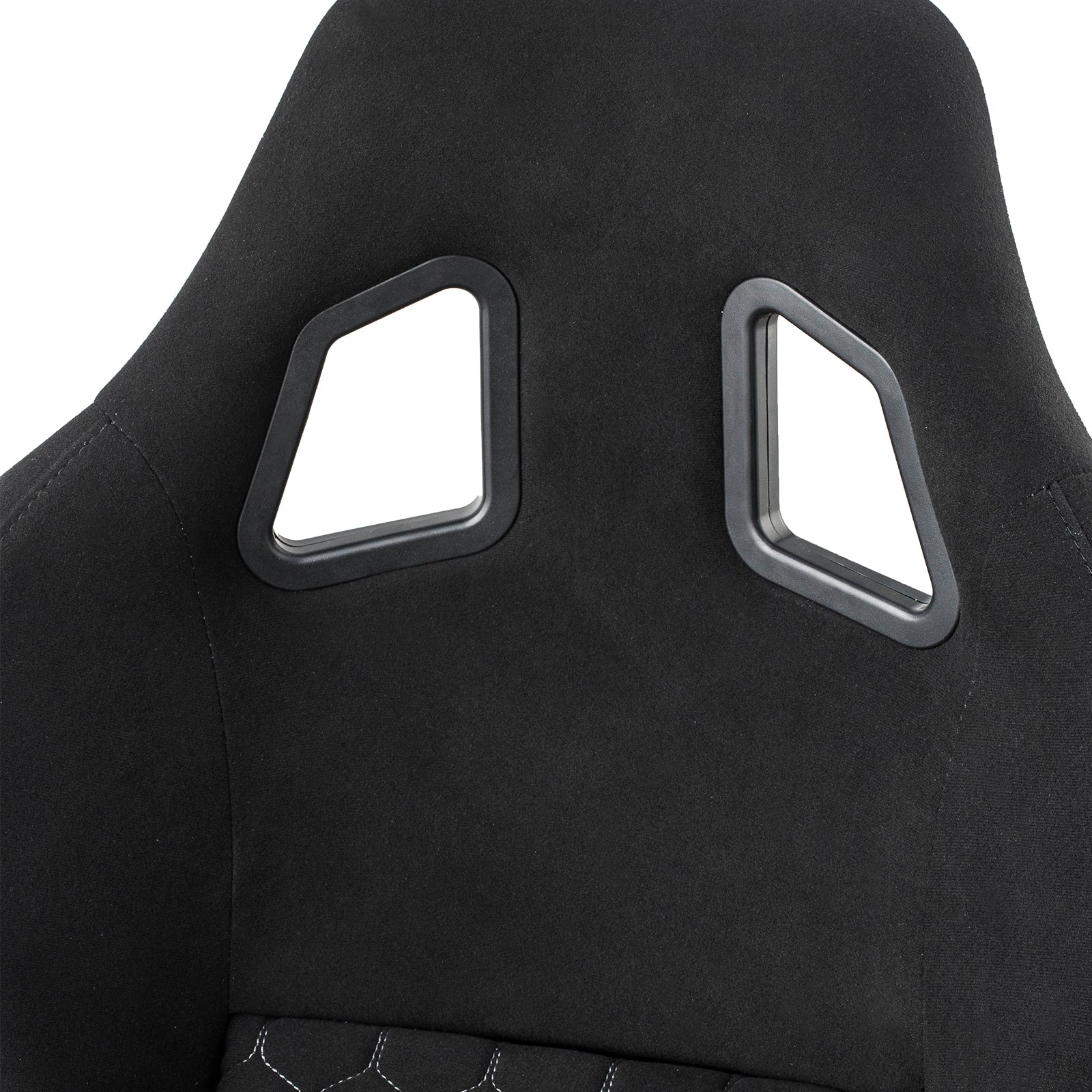 Black racing gaming chair headrest with distinctive cutouts and white stitching detail