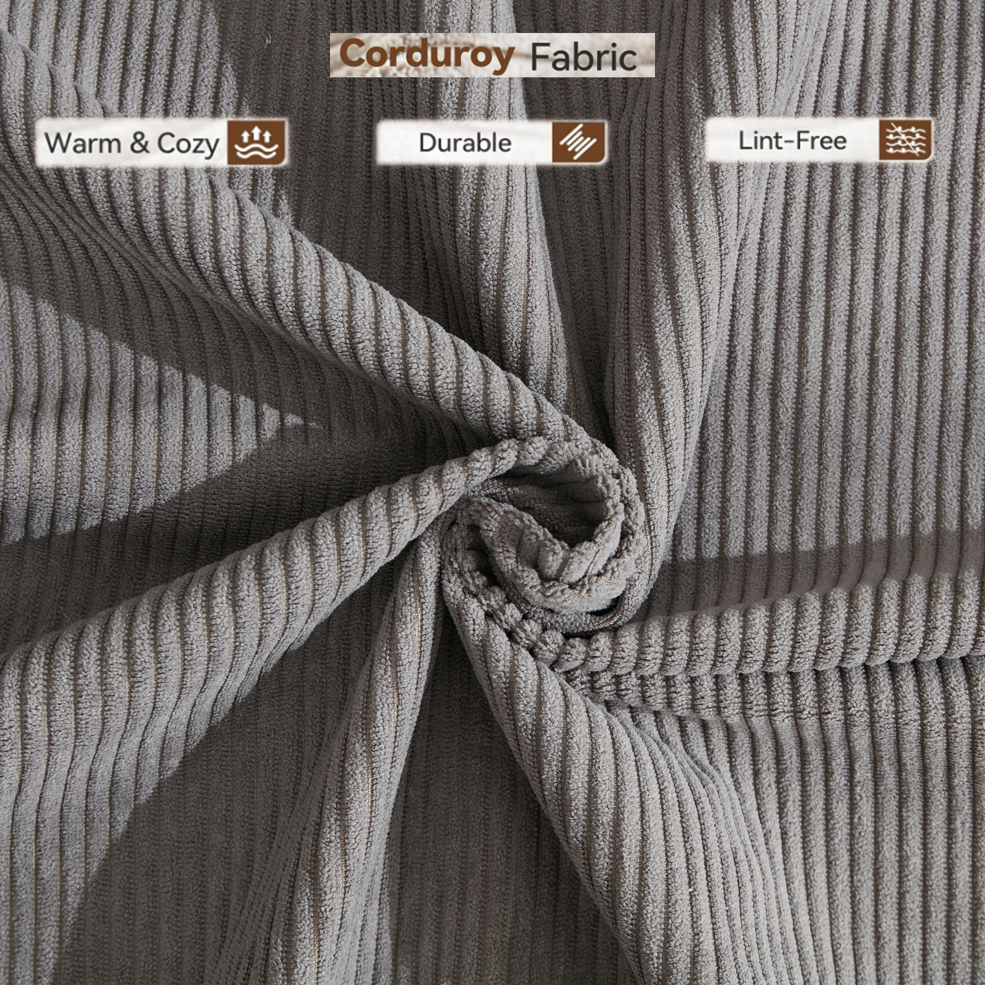 Closeup of textured grey corduroy fabric showcasing its plush feel and vertical wales for upholstery