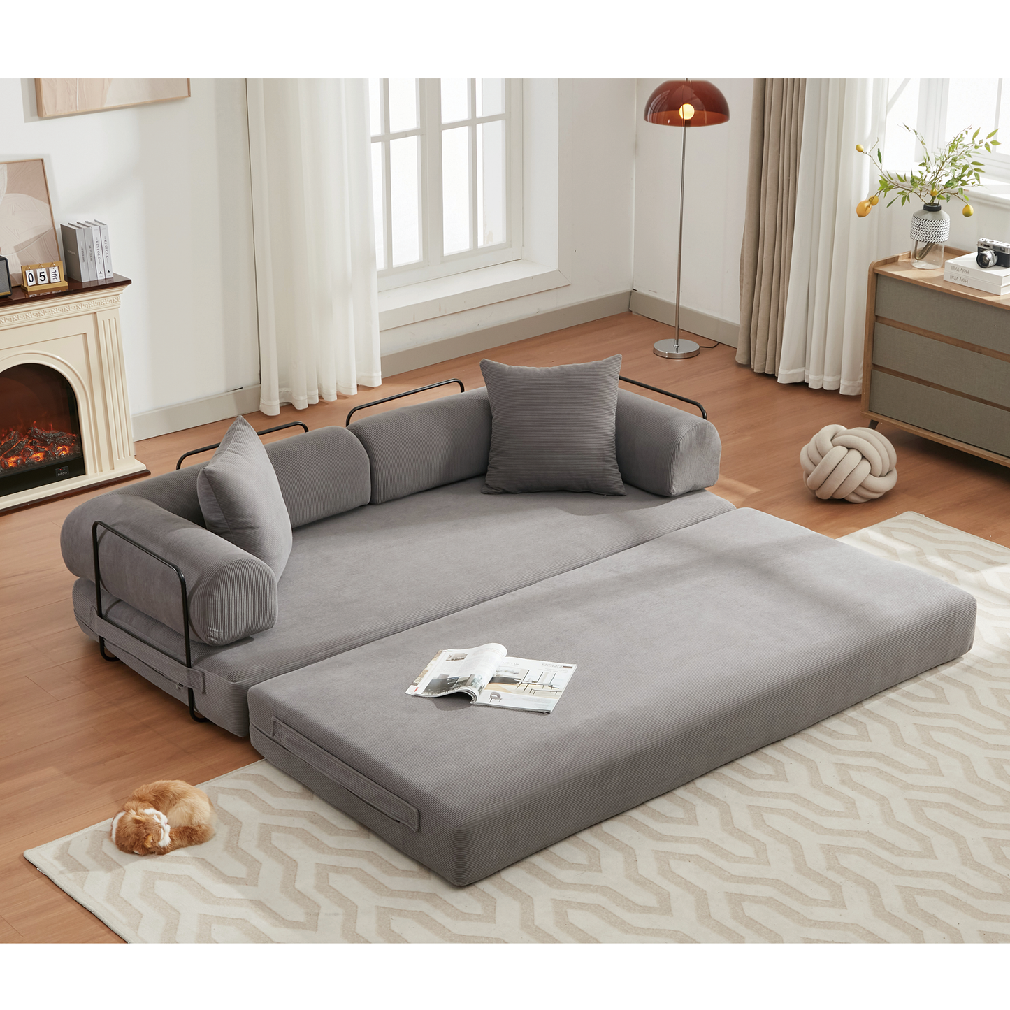 Grey corduroy modular sofa with metal frame and matching throw pillows