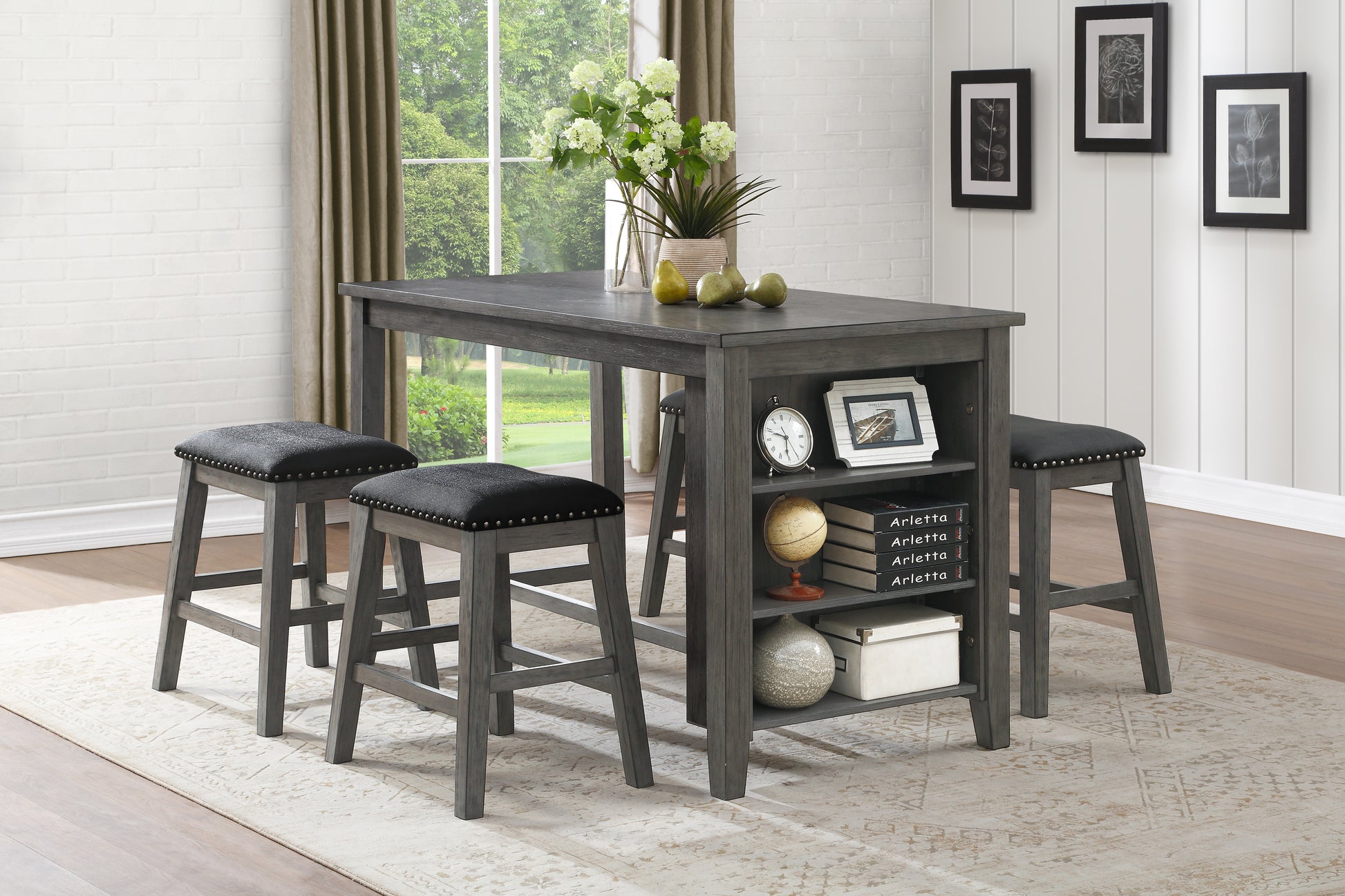 Dark grey wood pub table set with upholstered stools perfect for small spaces