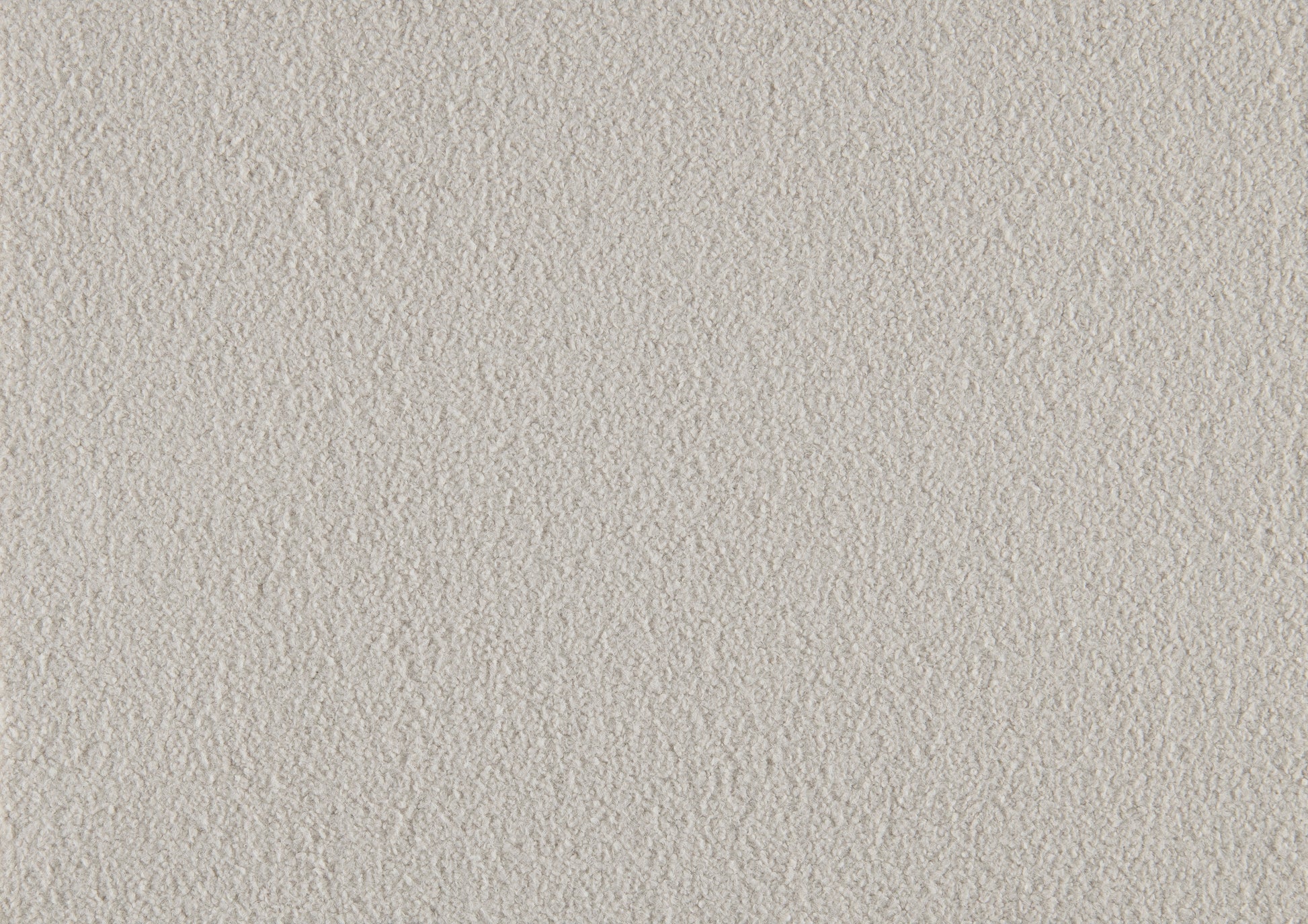 Textured offwhite fleece fabric closeup ideal for cozy apparel