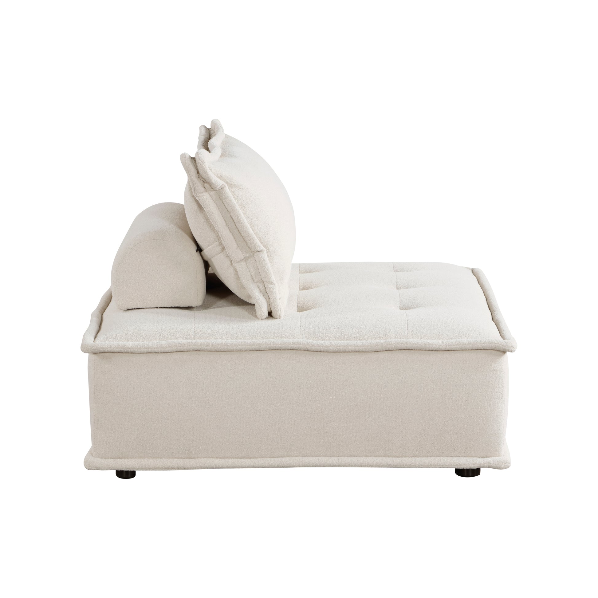 Cream boucle modular sofa with tufted seat cushion and bolster pillow