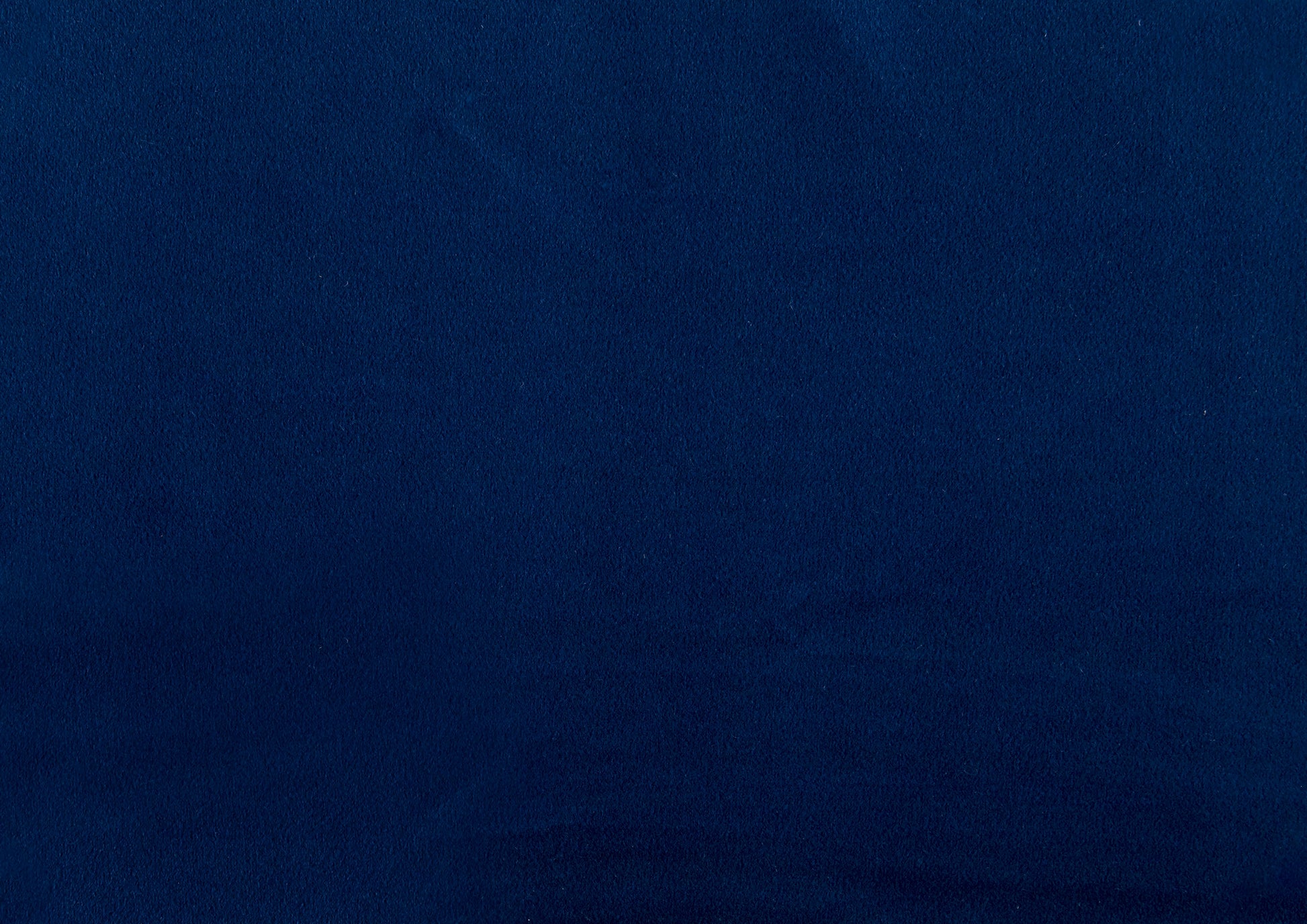 Deep navy blue velvet fabric swatch with a subtle texture