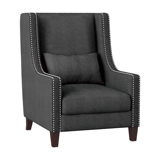 Dark gray upholstered wingback accent chair with silver nailhead trim