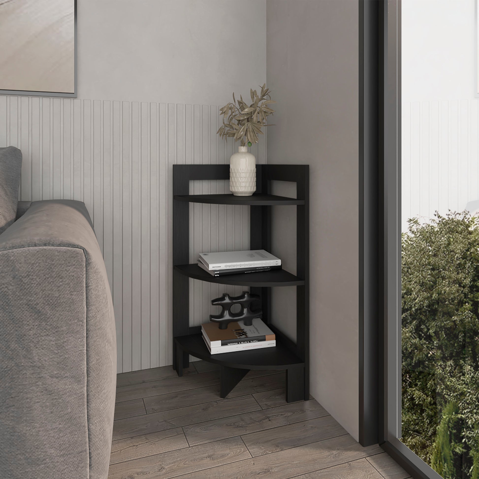 Black threetier corner shelf with books and decorative object